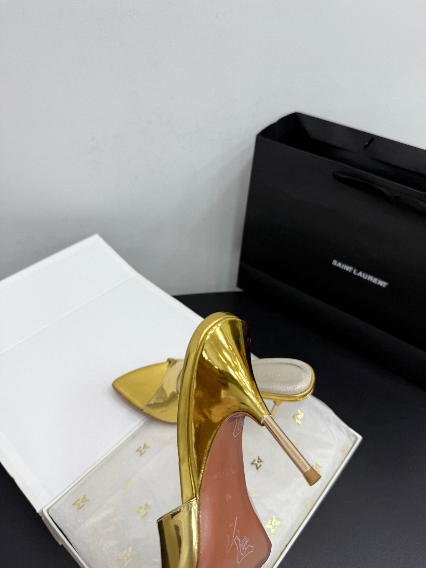 AMINA M HEELS