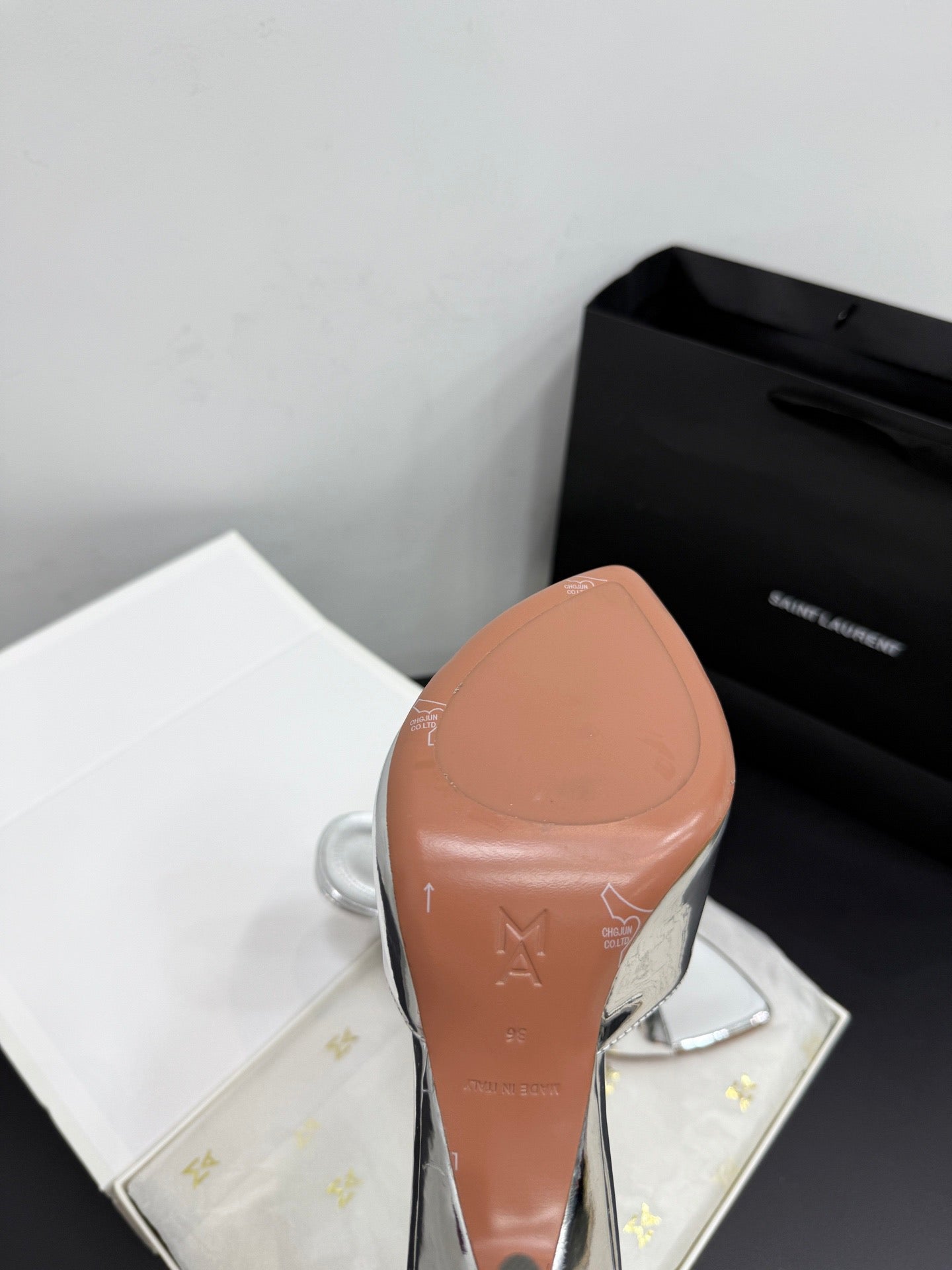 AMINA M HEELS