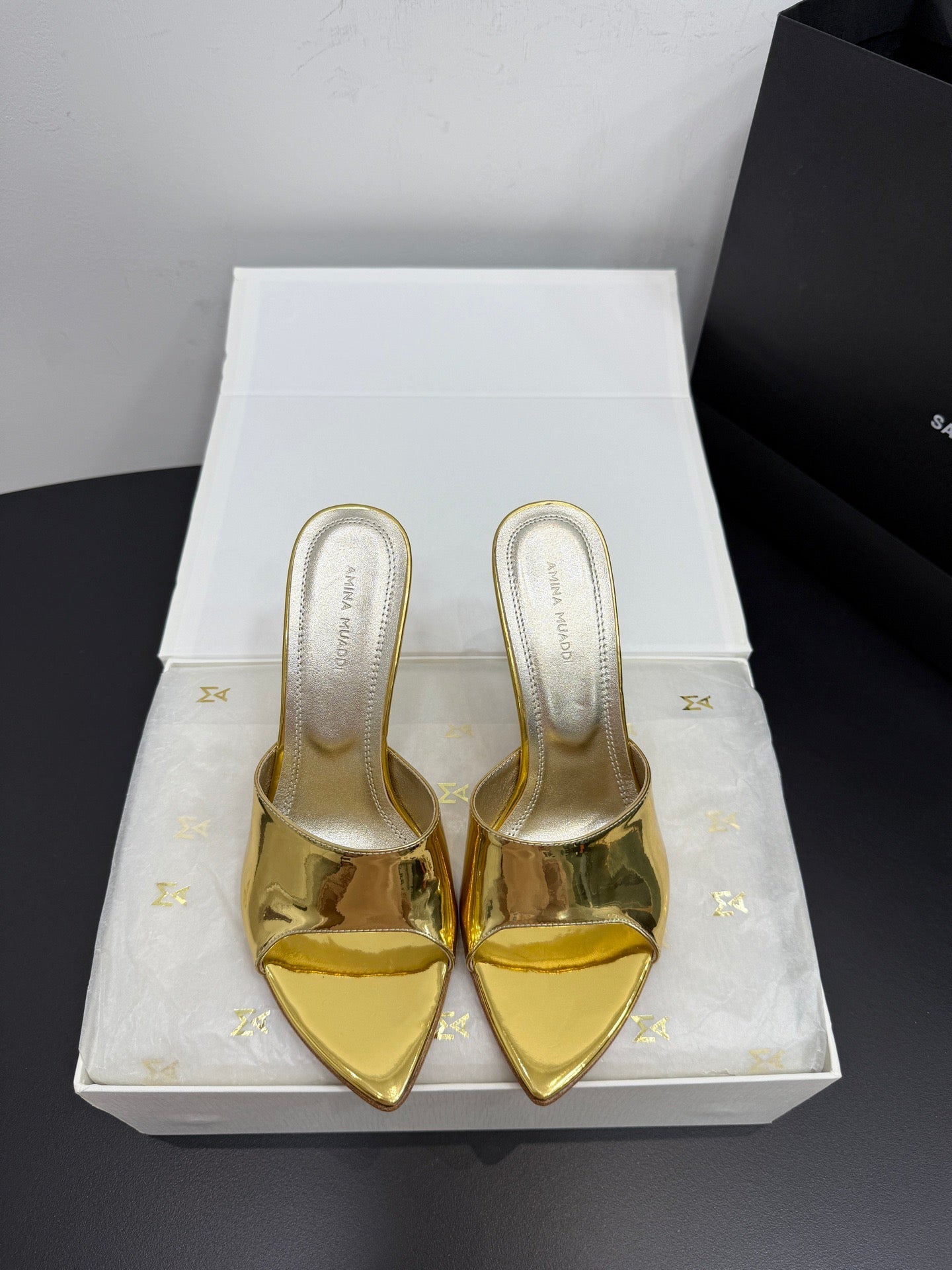 AMINA M HEELS