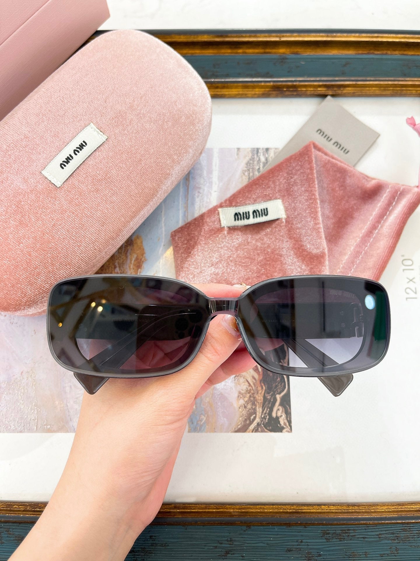 MIU M SUNGLASSES