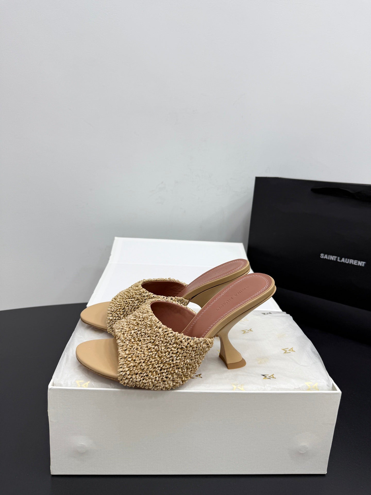 AMINA M HEELS
