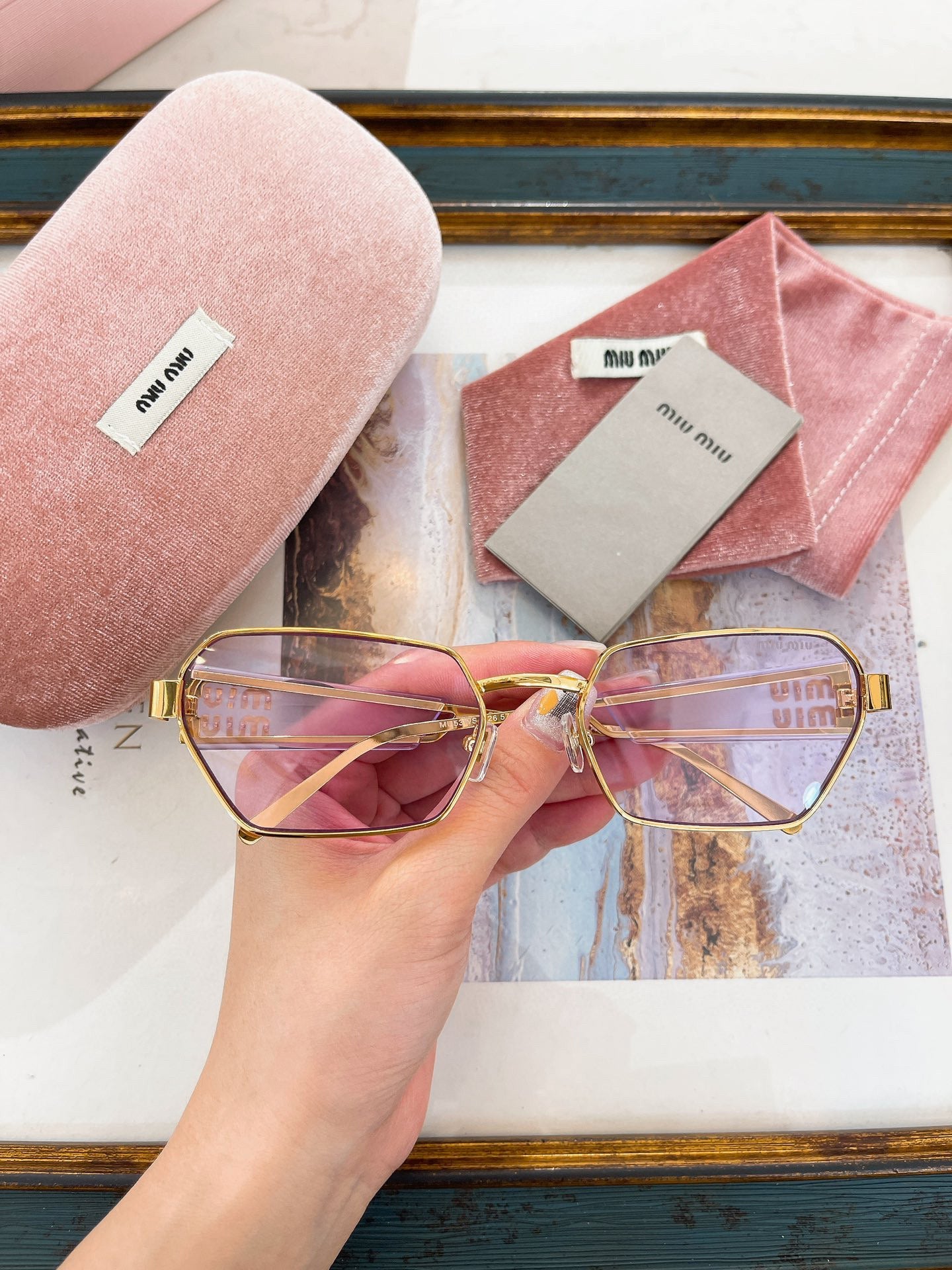 MIU M SUNGLASSES