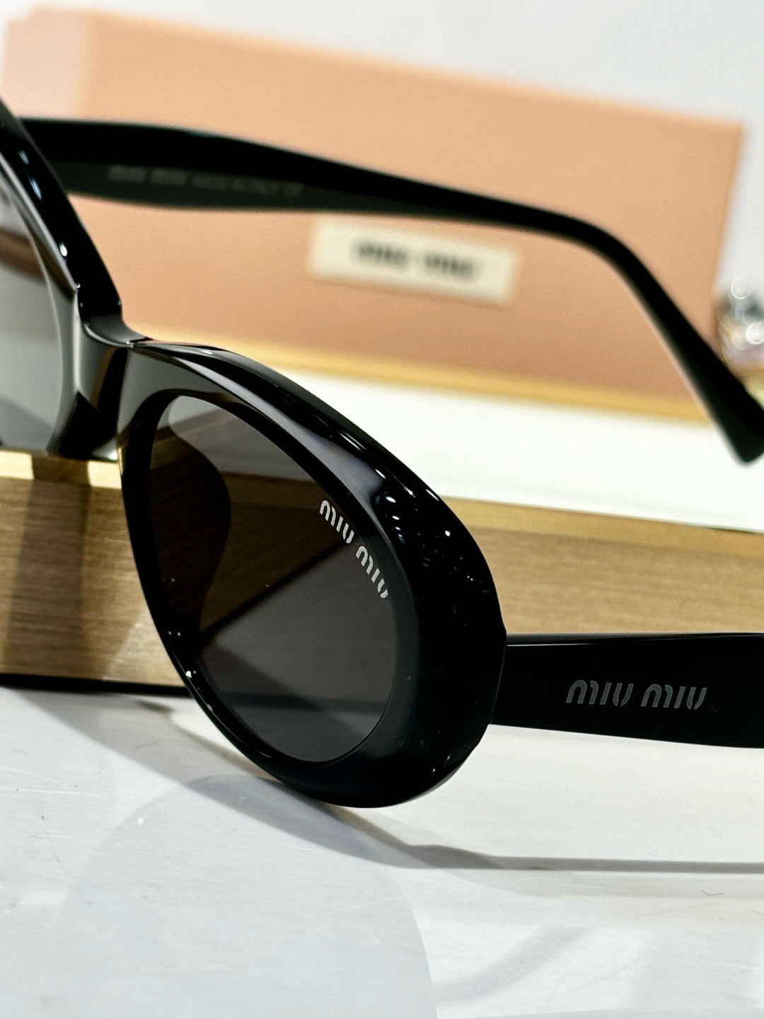 MIU M SUNGLASSES