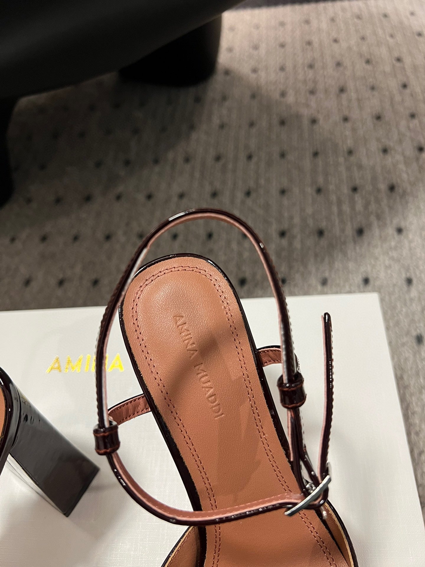 AMINA M HEELS