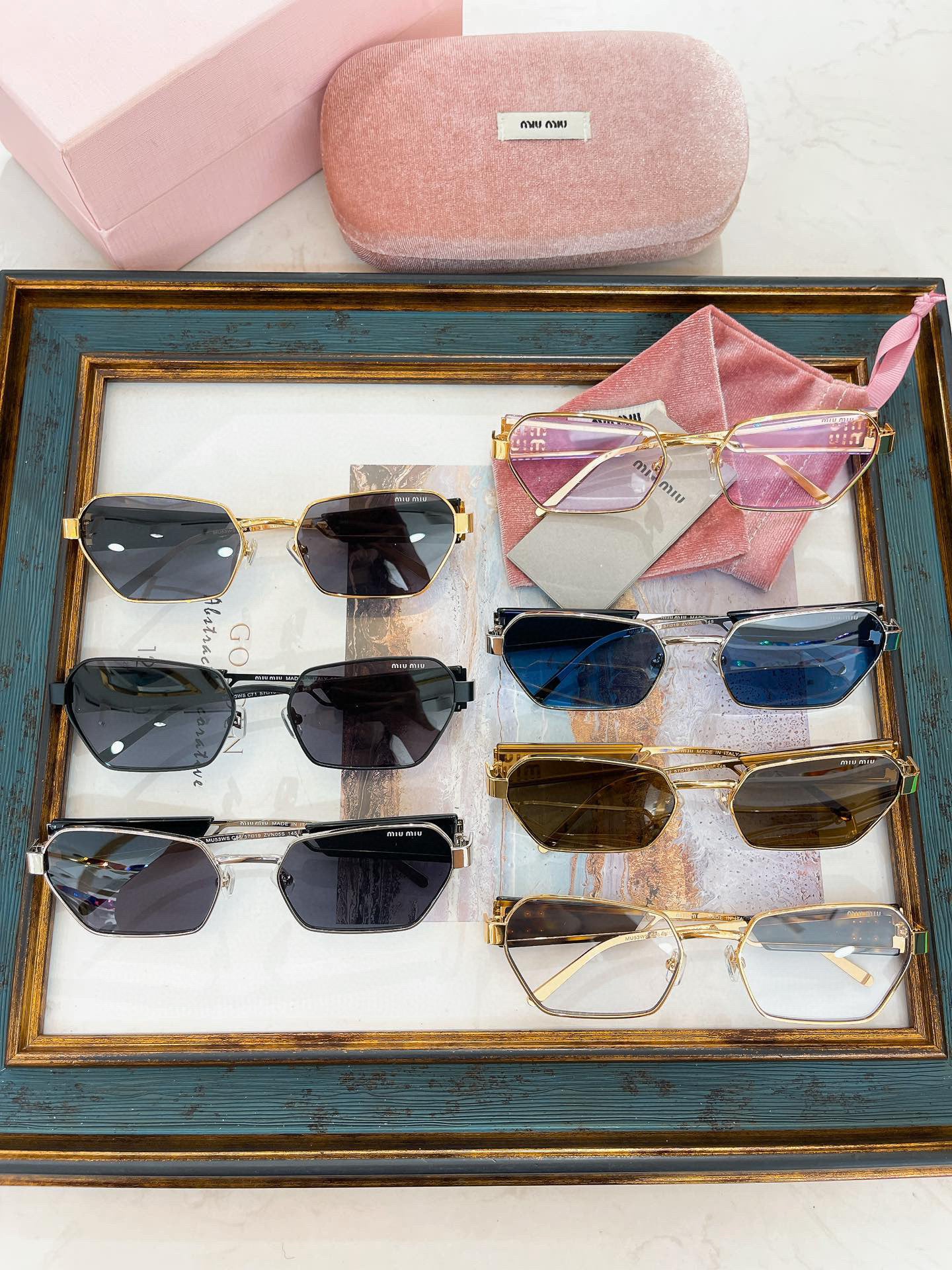 MIU M SUNGLASSES