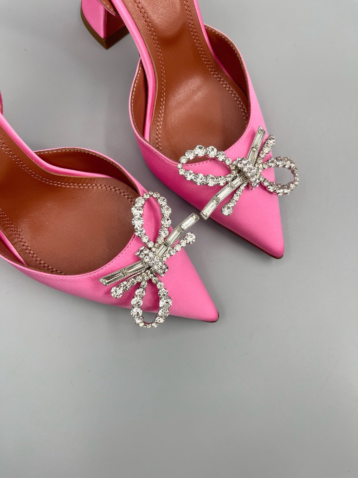AMINA M HEELS