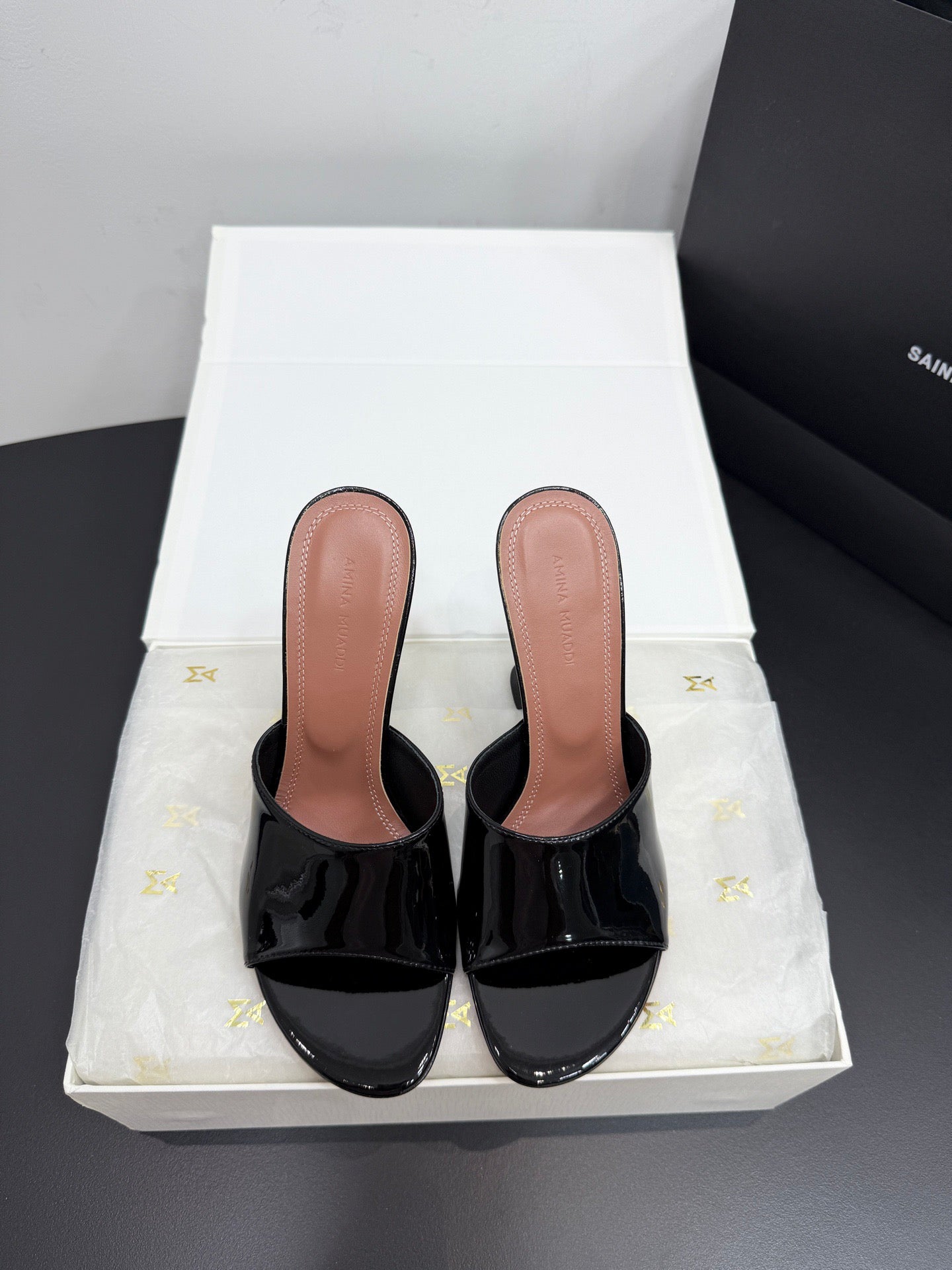 AMINA M HEELS