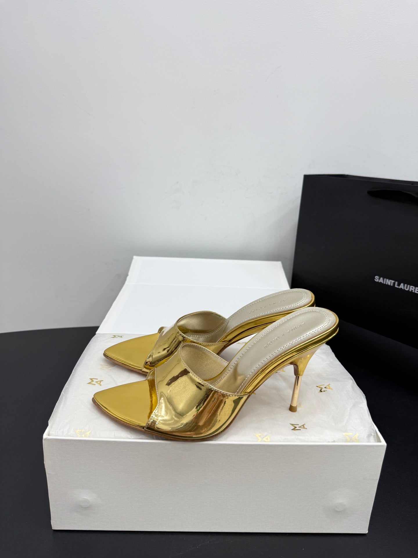 AMINA M HEELS