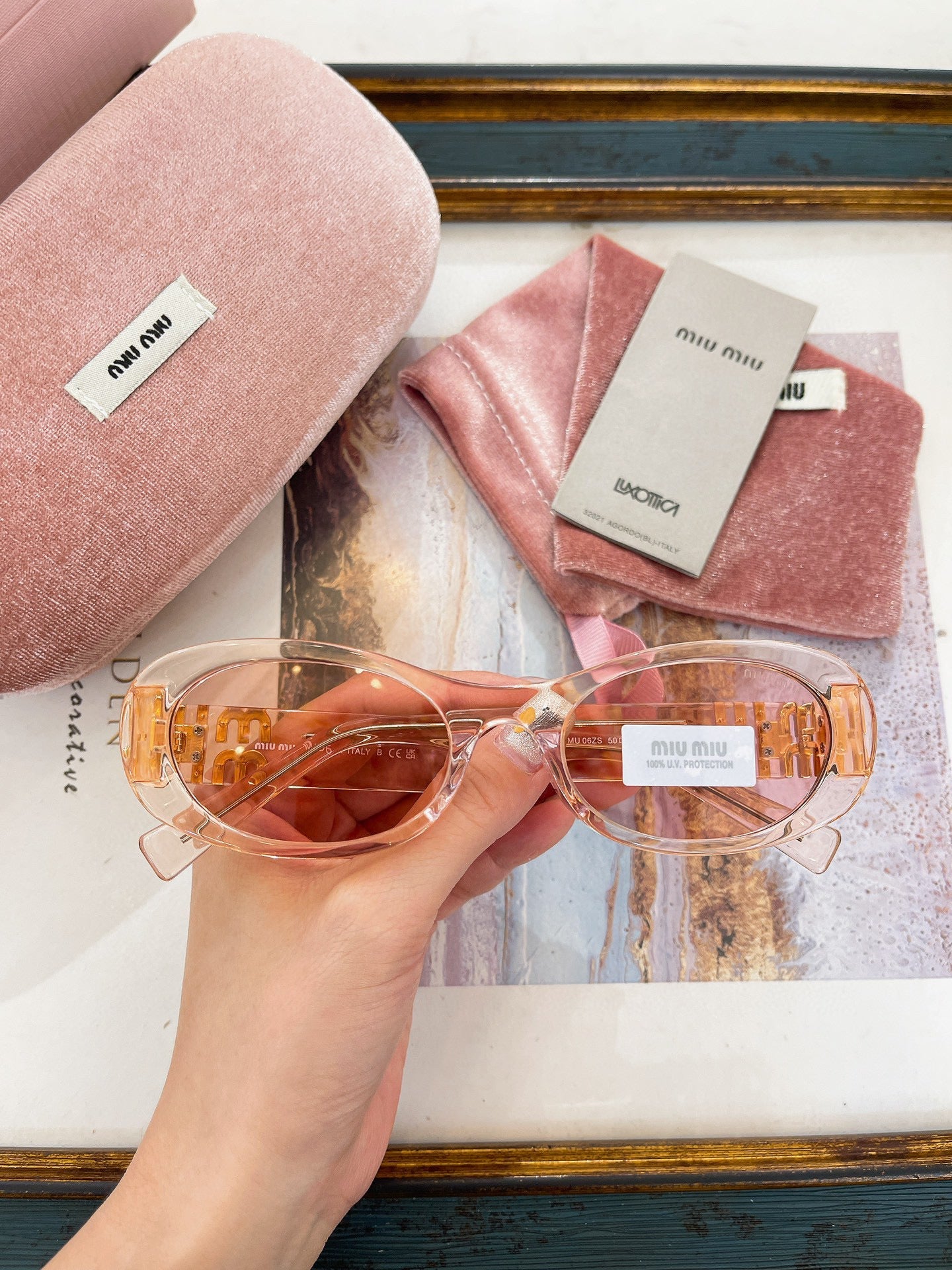 MIU M SUNGLASSES