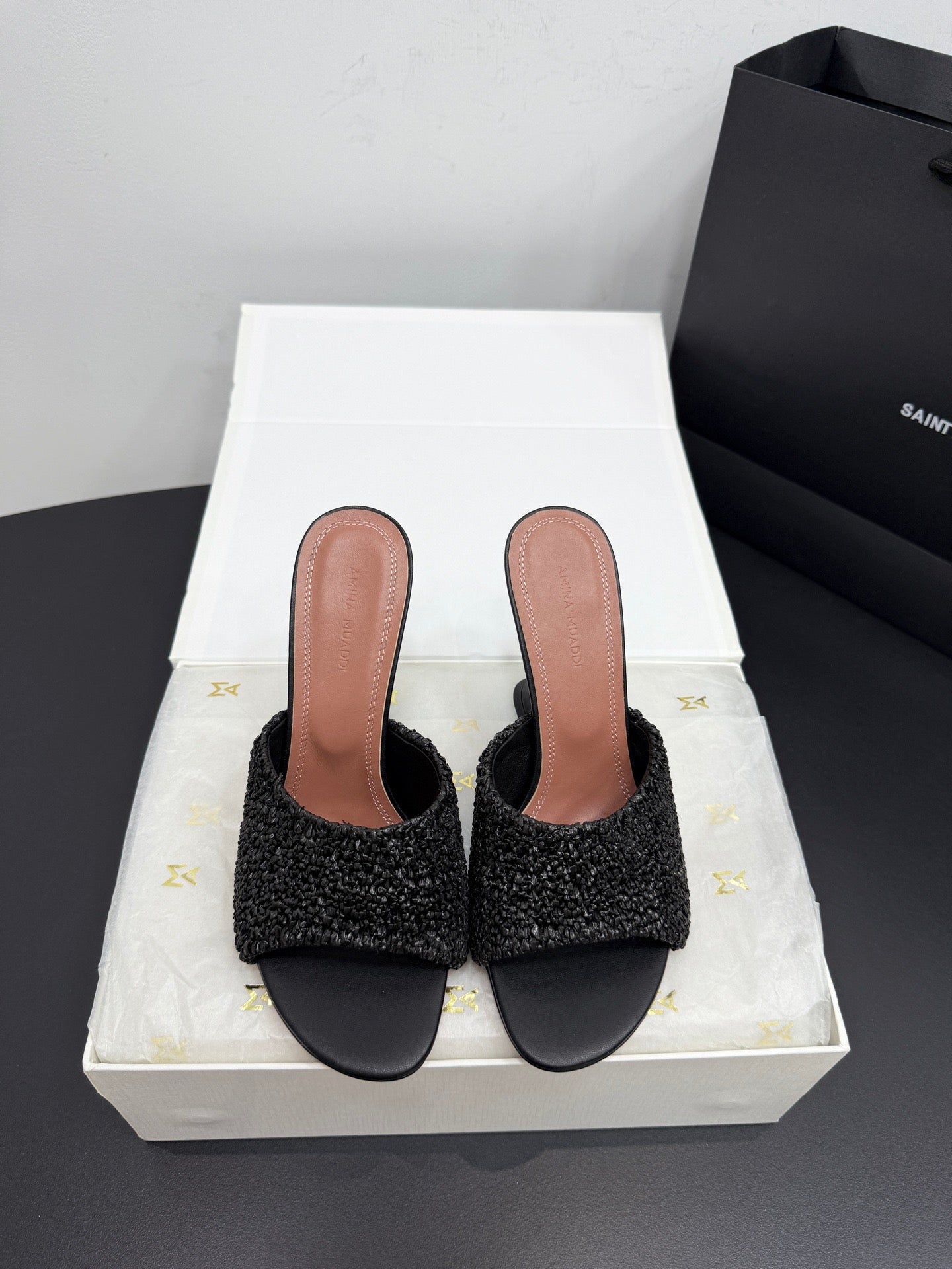 AMINA M HEELS