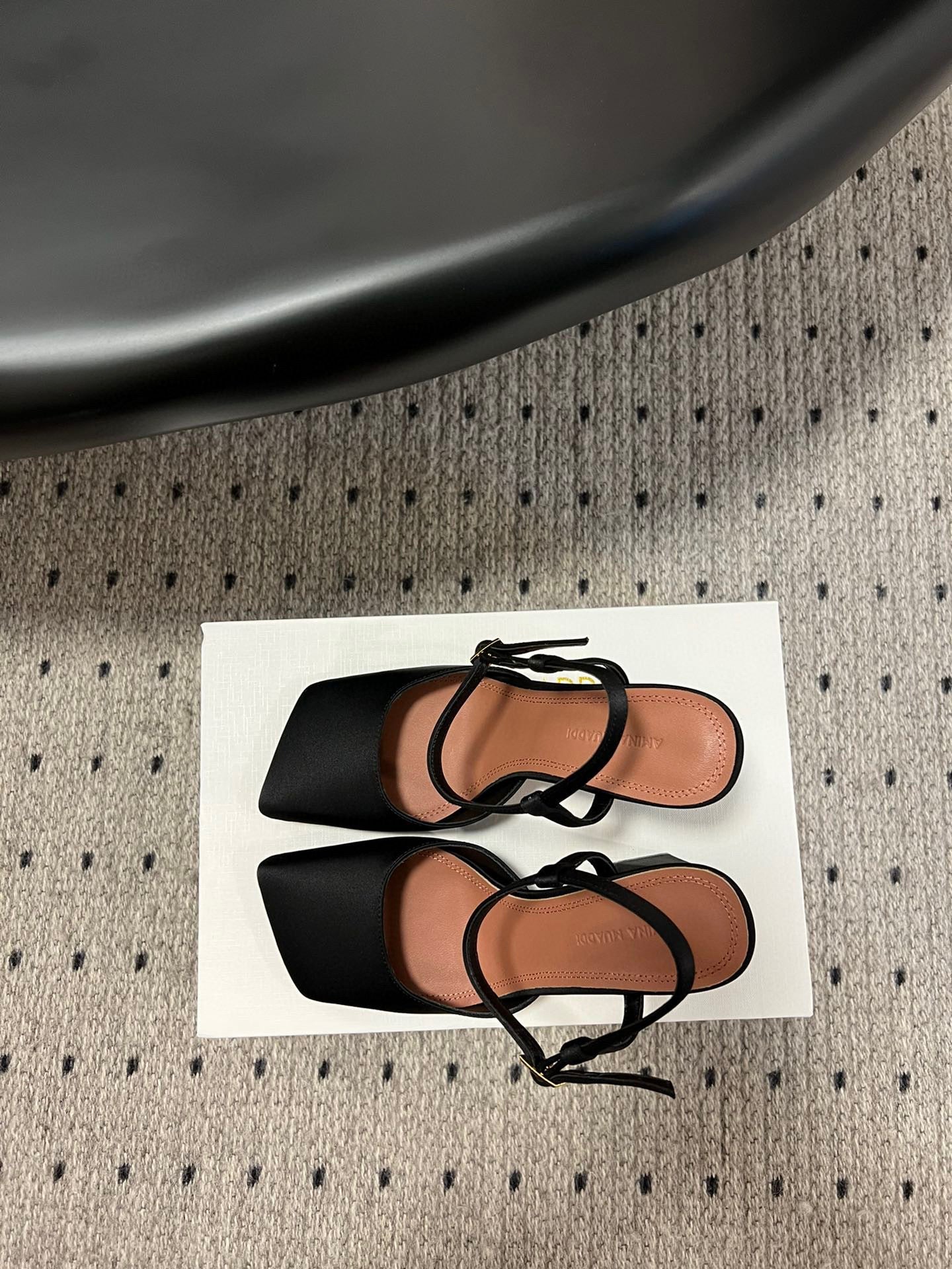 AMINA M HEELS