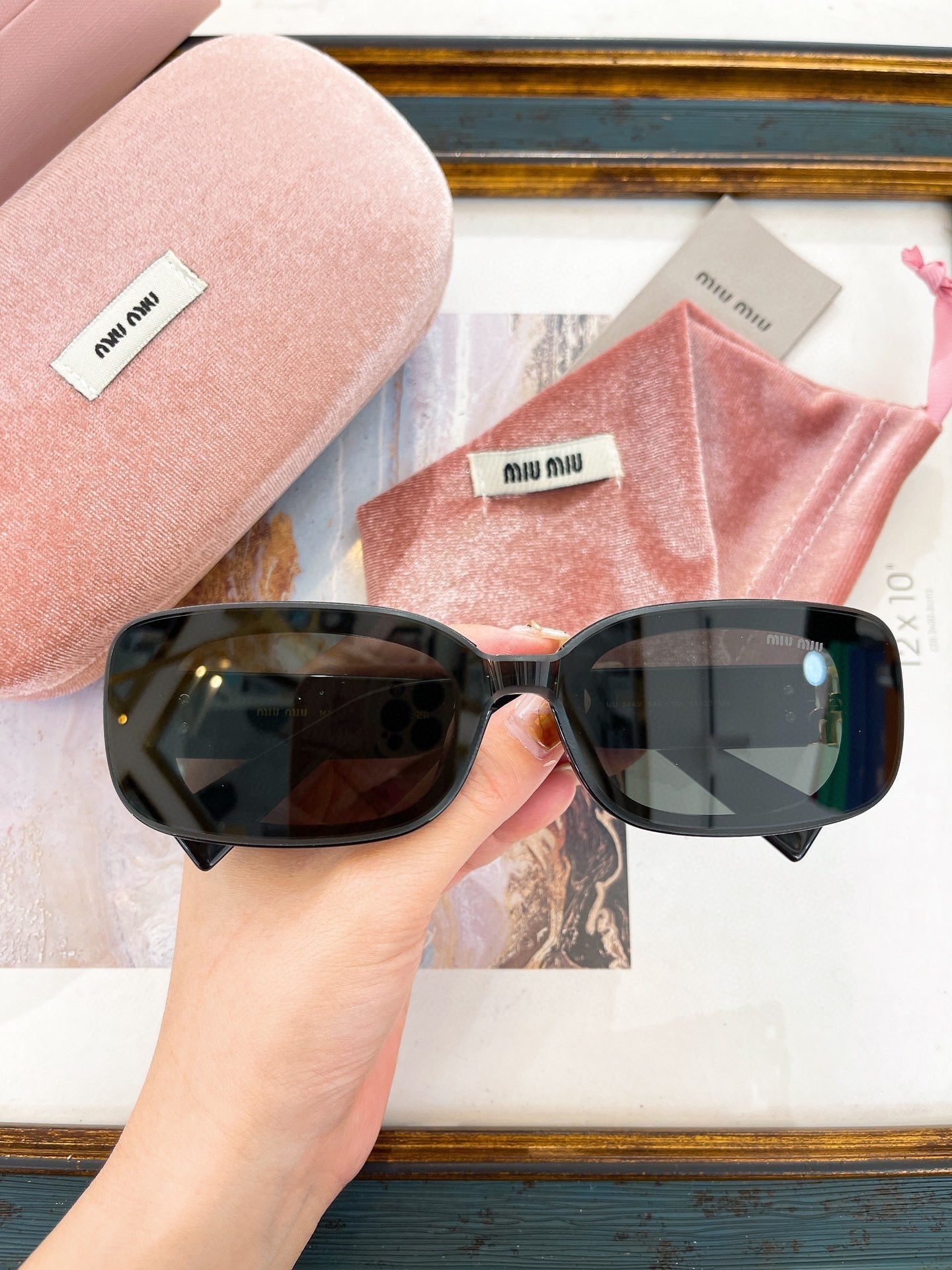 MIU M SUNGLASSES