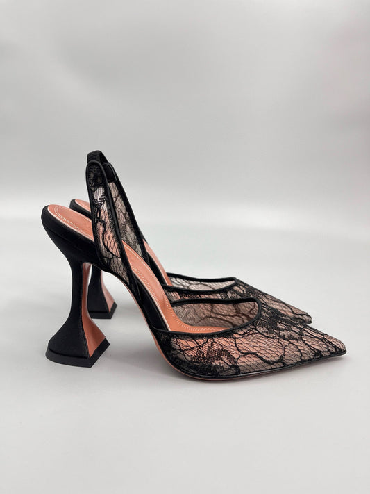 AMINA M HEELS