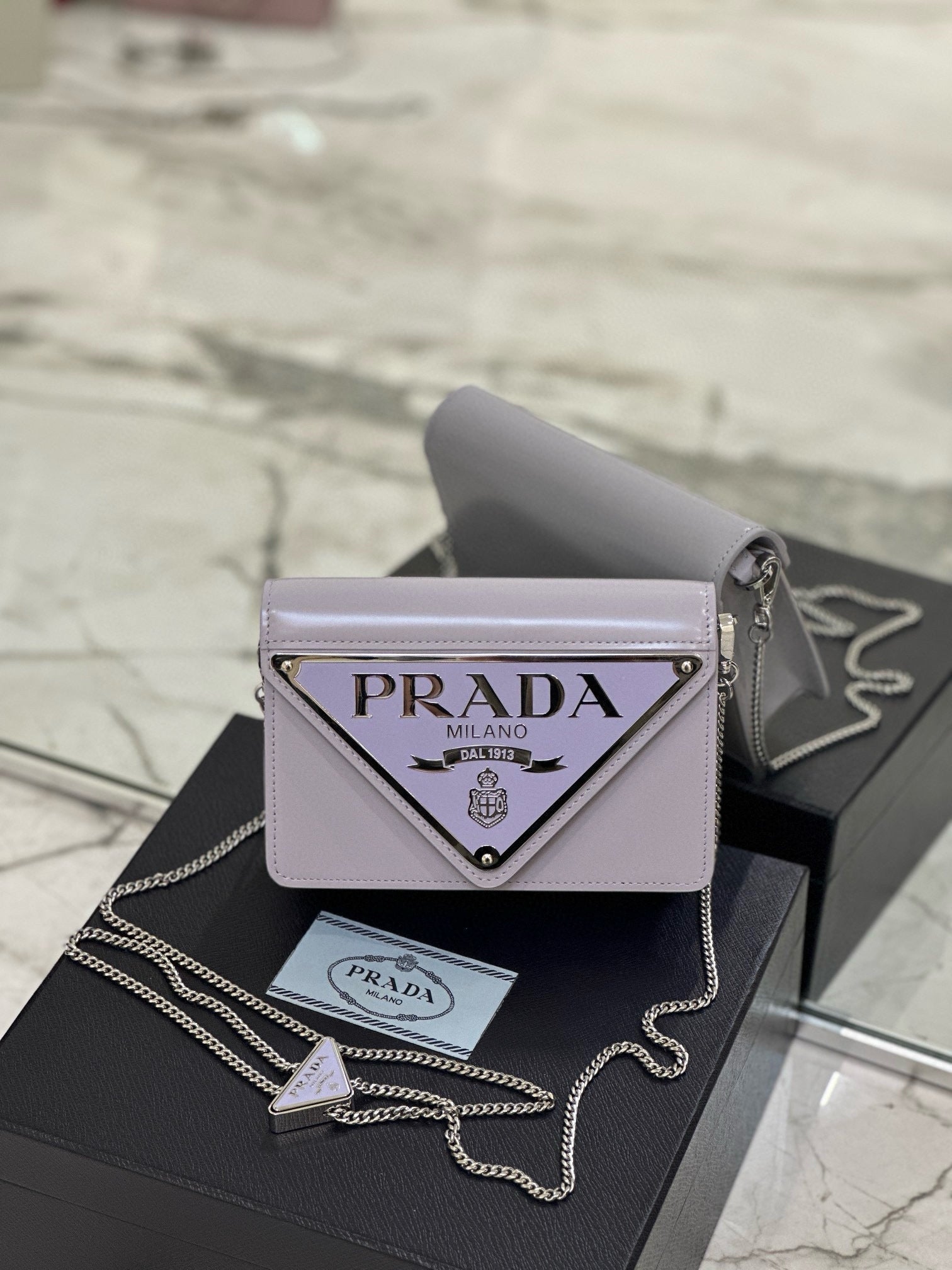 PD TRIANGLE LOGO BUFFED SHOULDER BAG