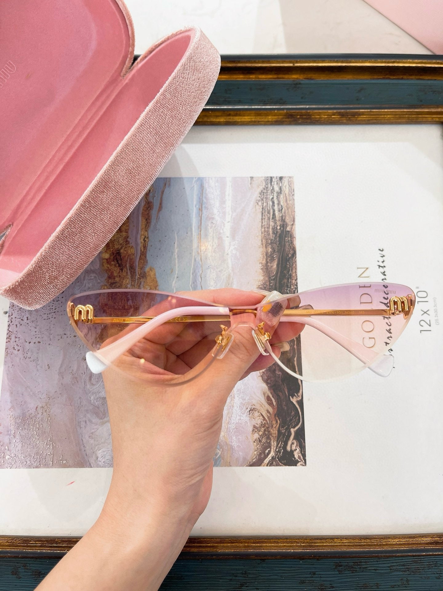 MIU M SUNGLASSES