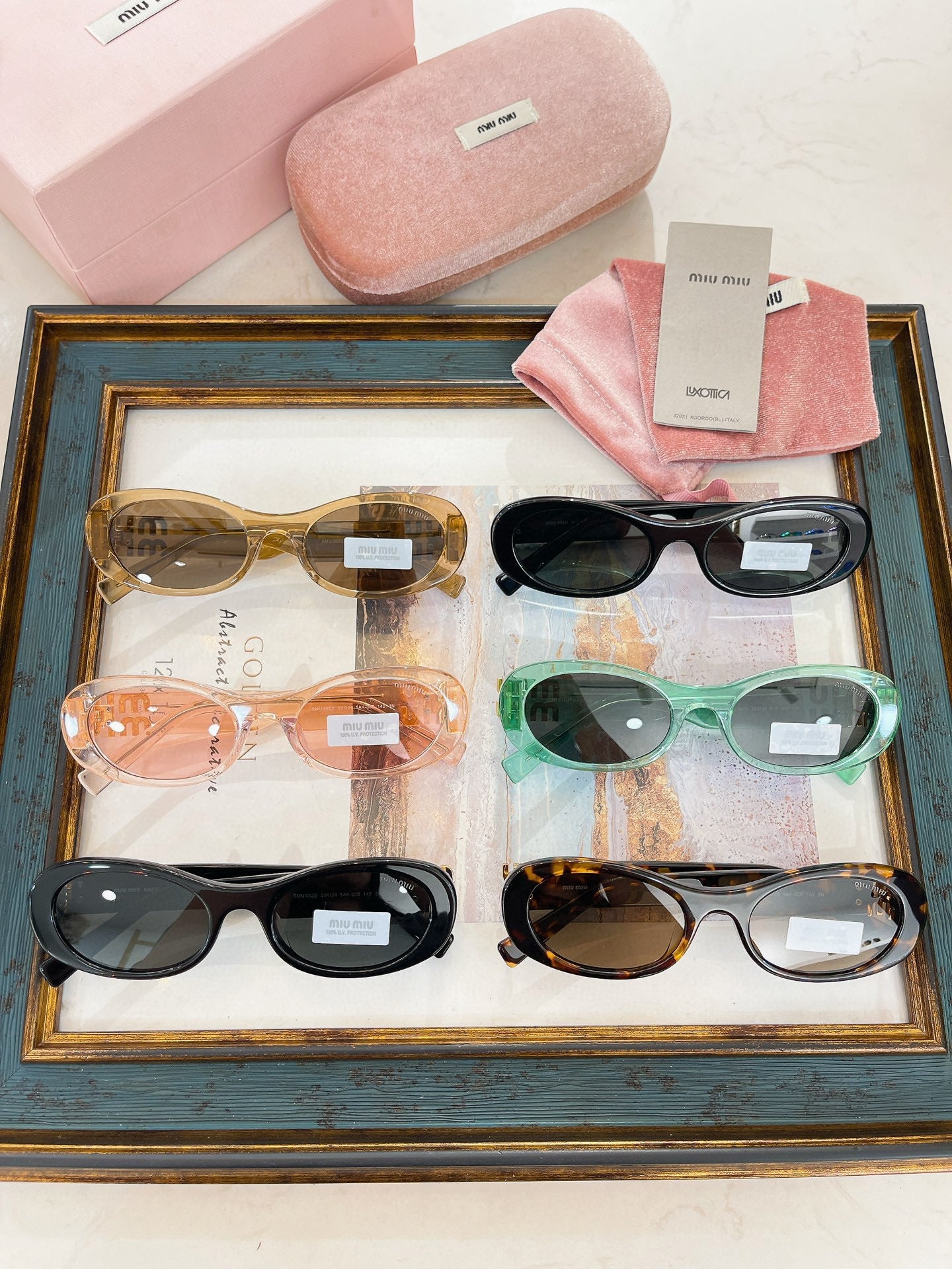MIU M SUNGLASSES
