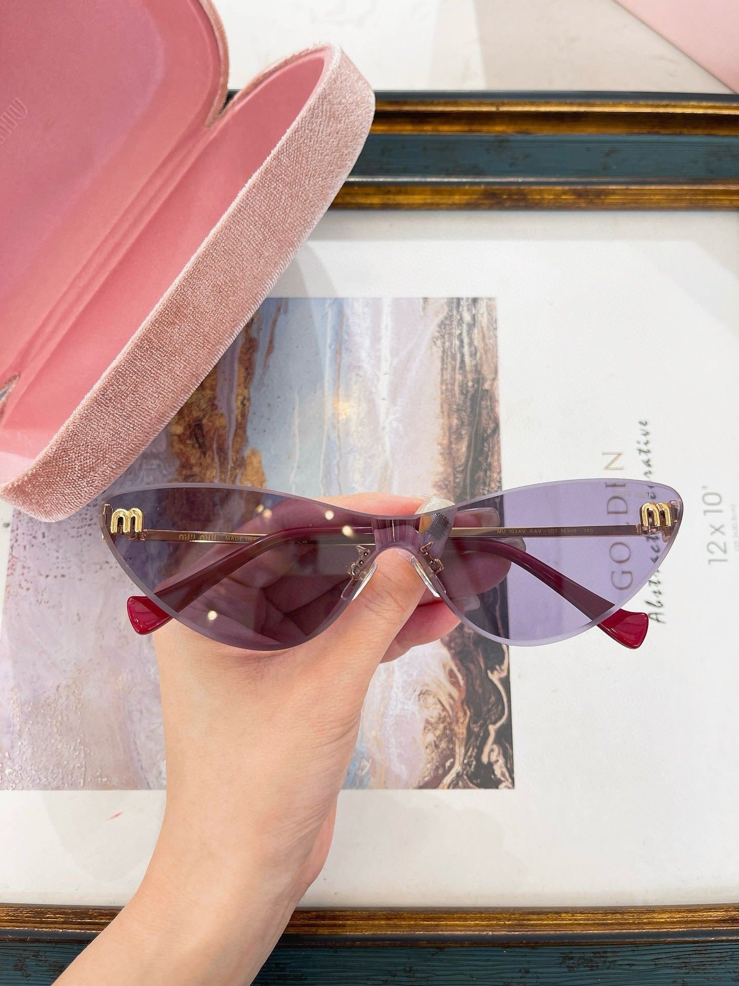 MIU M SUNGLASSES