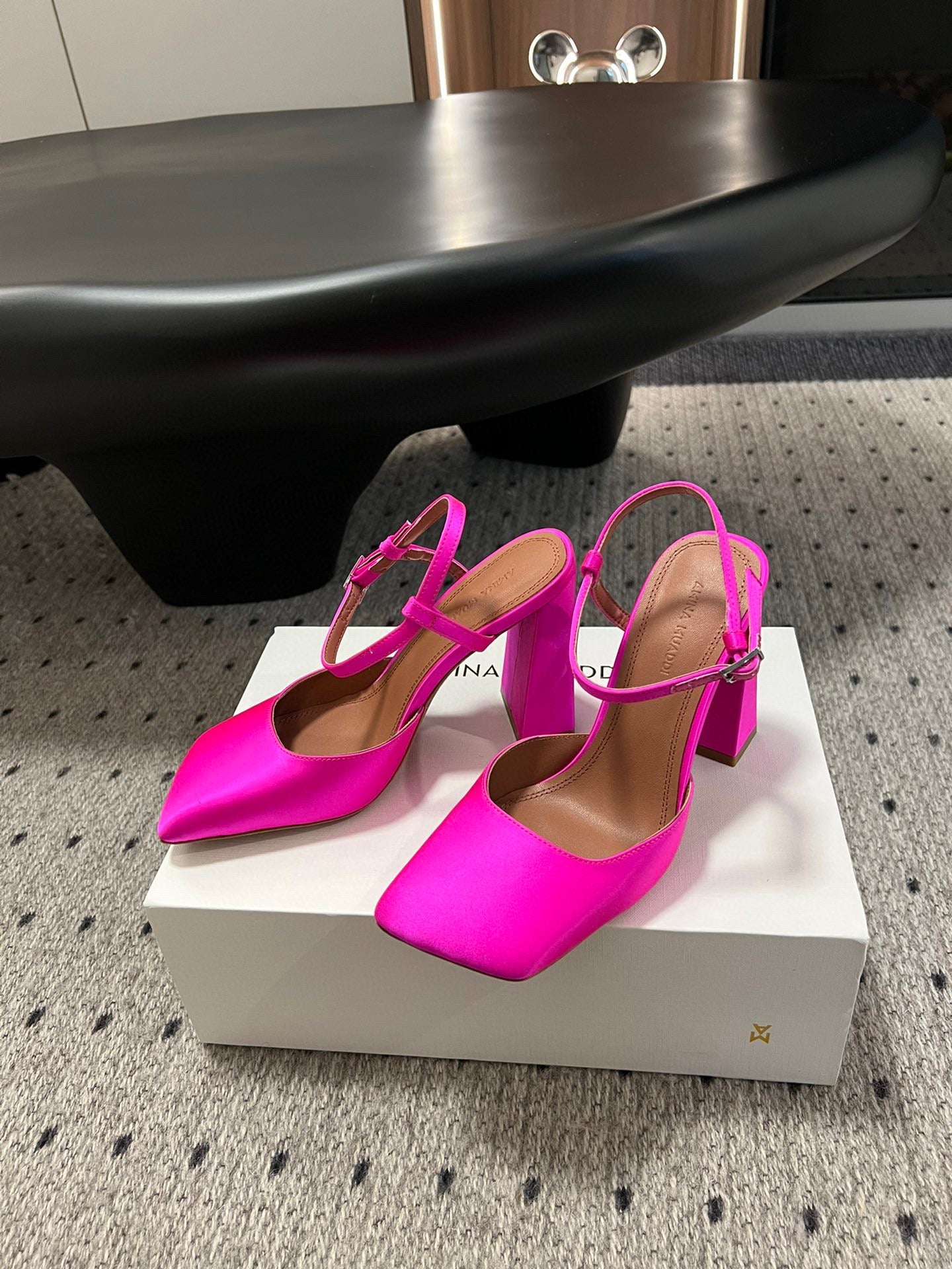 AMINA M HEELS