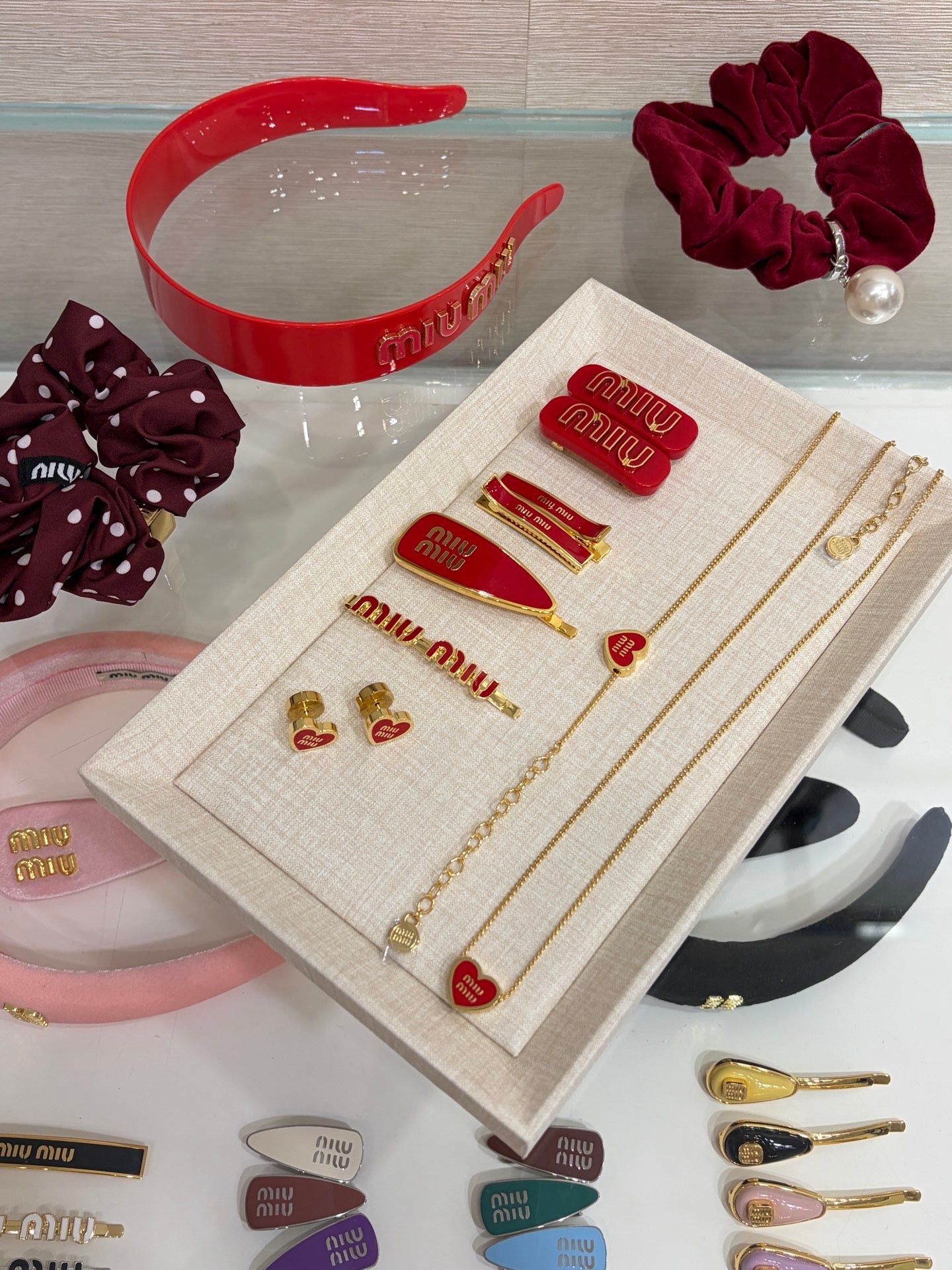 MIU M EARRINGS