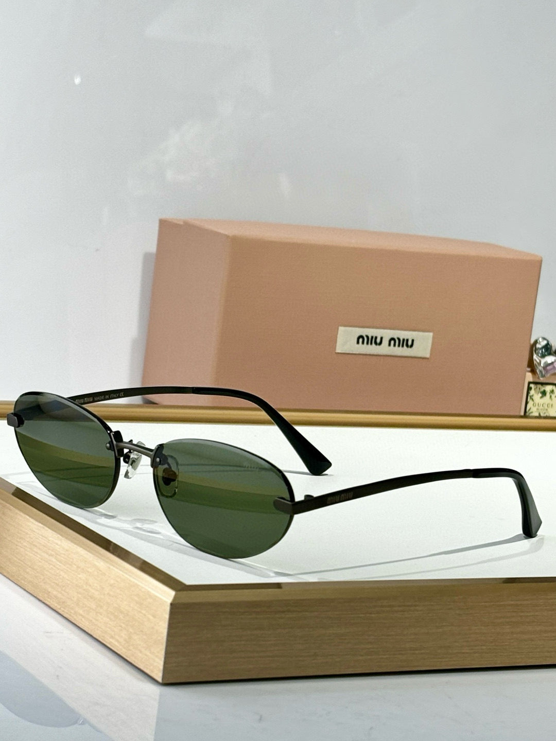 MIU M SUNGLASSES
