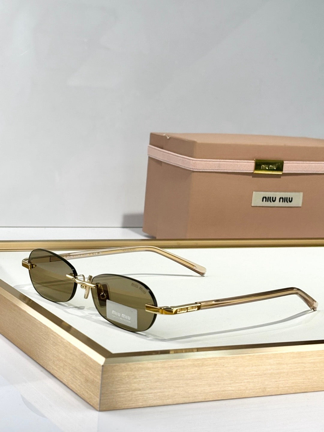 MIU M SUNGLASSES