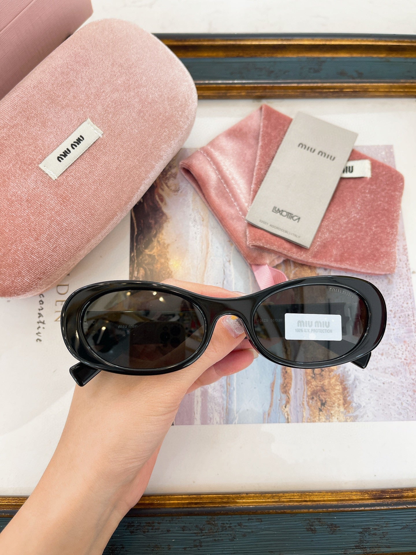 MIU M SUNGLASSES