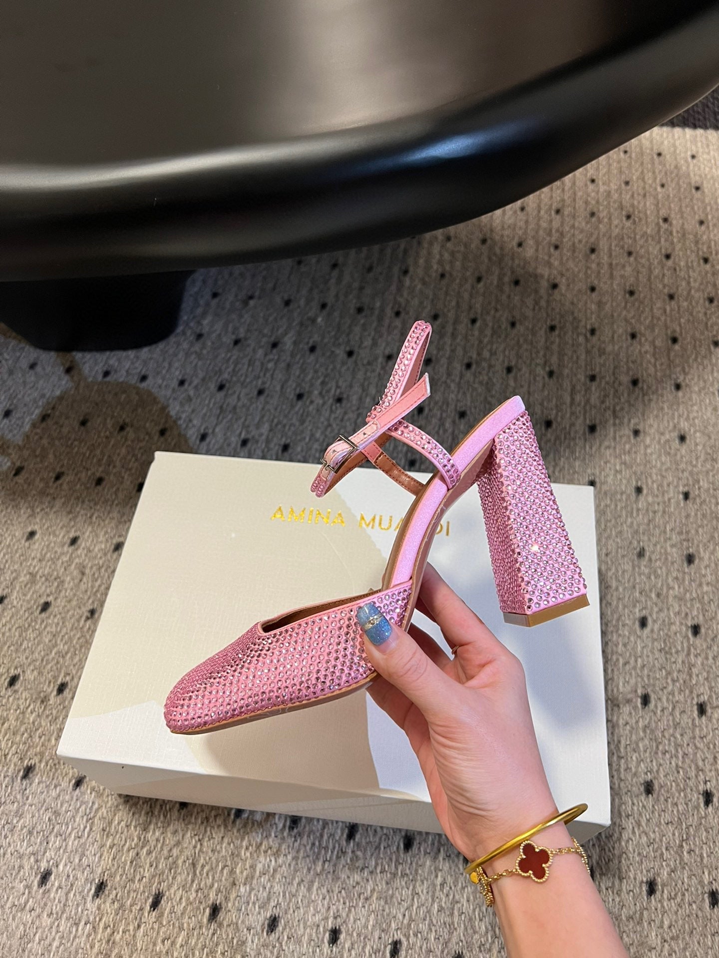 AMINA M HEELS