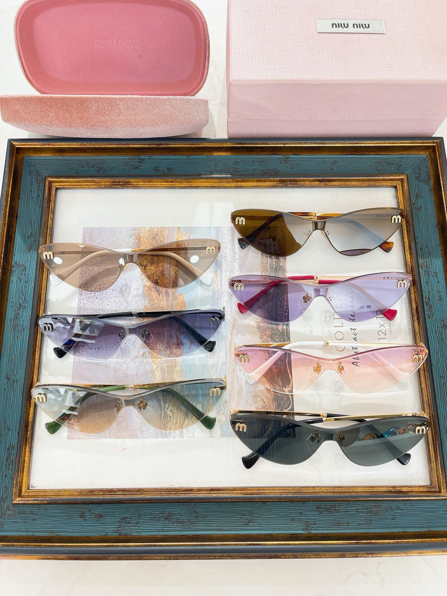 MIU M SUNGLASSES