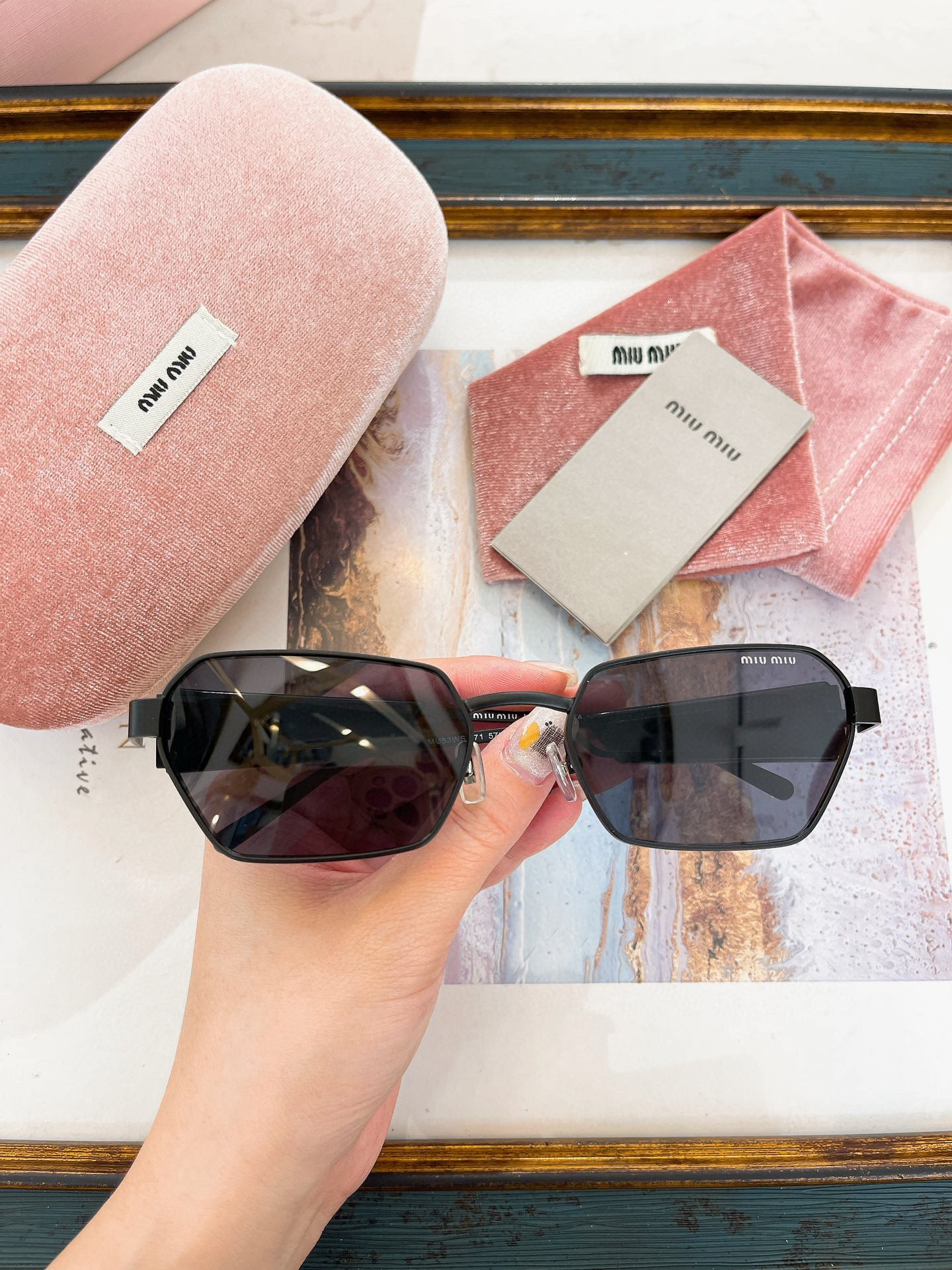 MIU M SUNGLASSES
