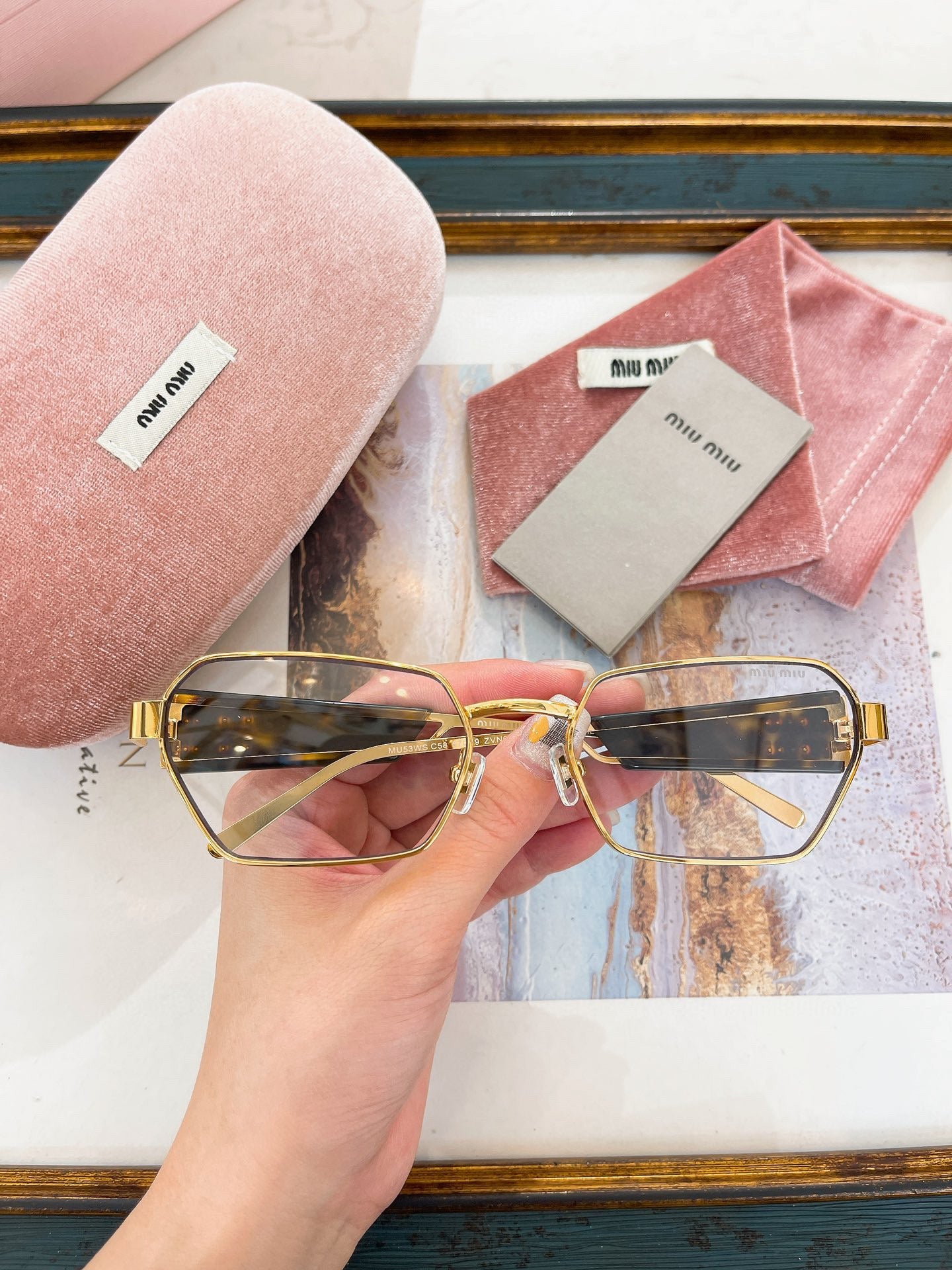 MIU M SUNGLASSES