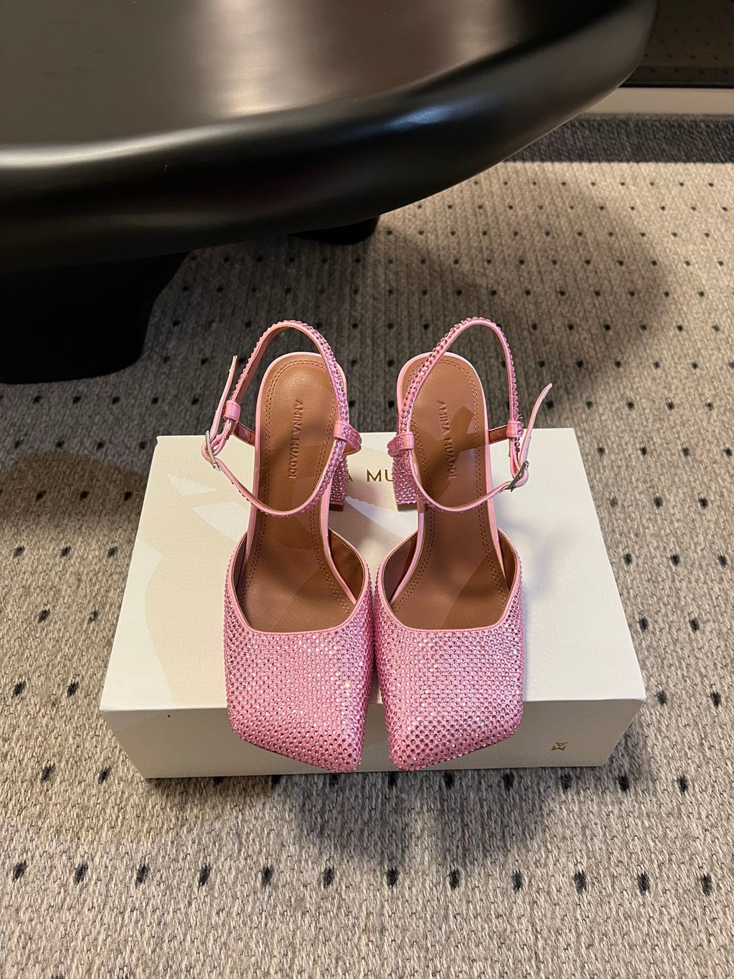AMINA M HEELS