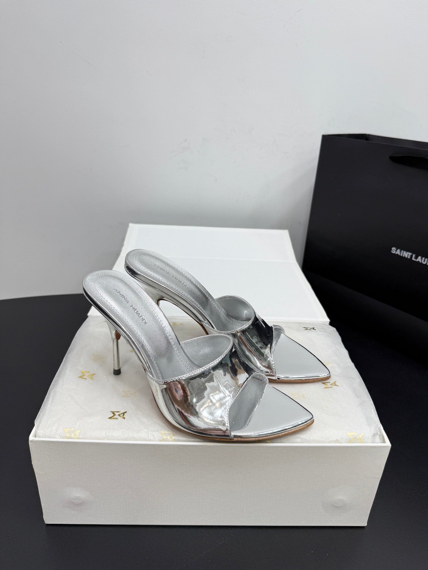 AMINA M HEELS