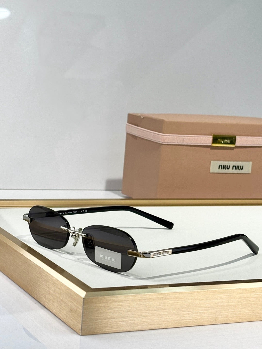 MIU M SUNGLASSES