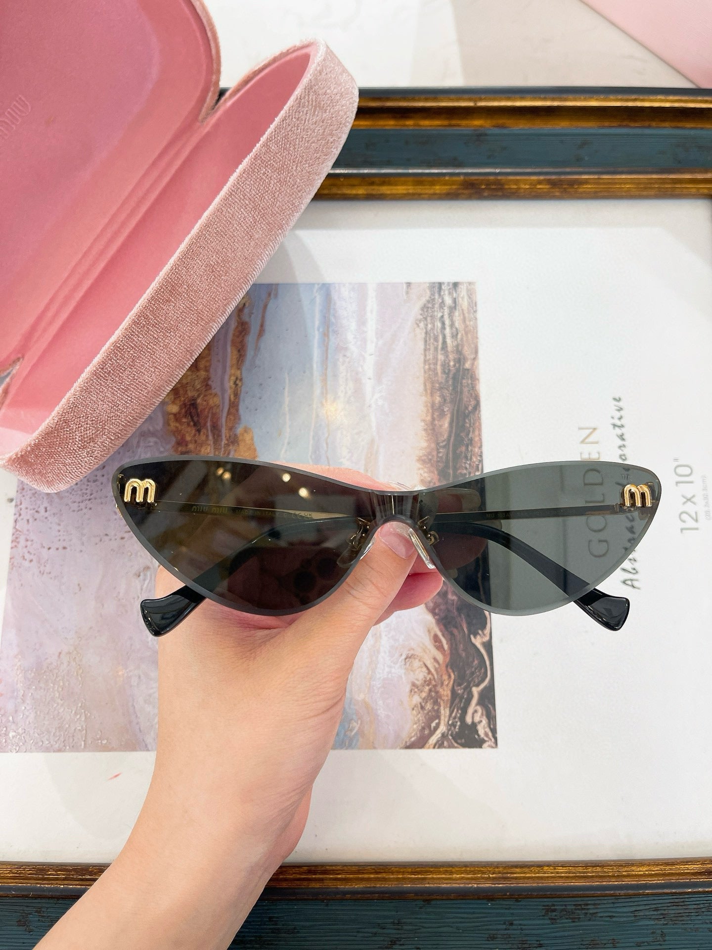 MIU M SUNGLASSES