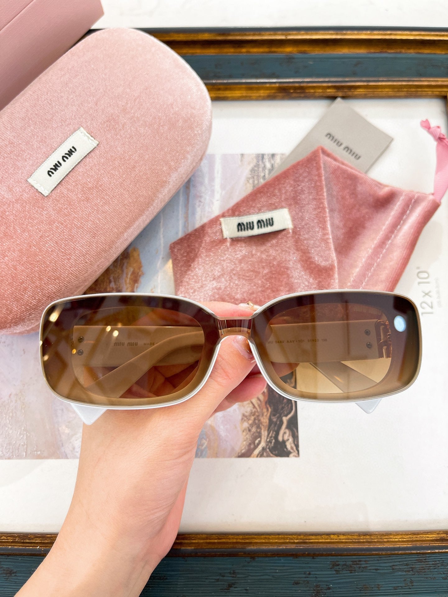 MIU M SUNGLASSES
