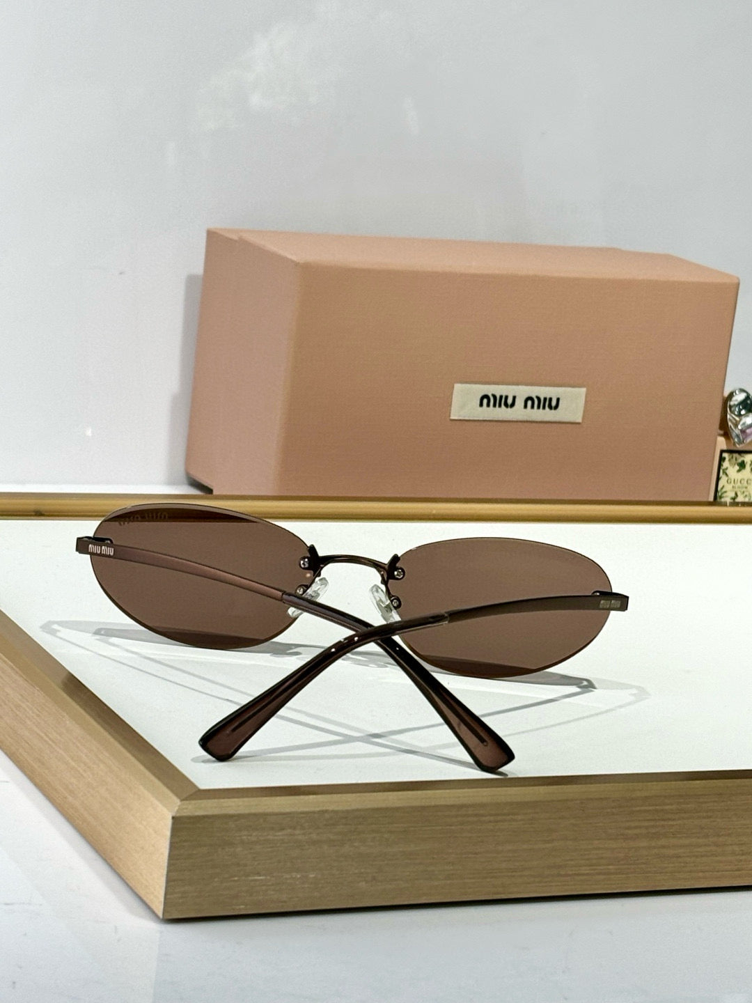 MIU M SUNGLASSES