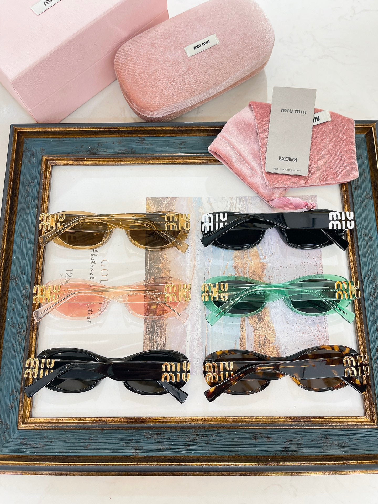 MIU M SUNGLASSES