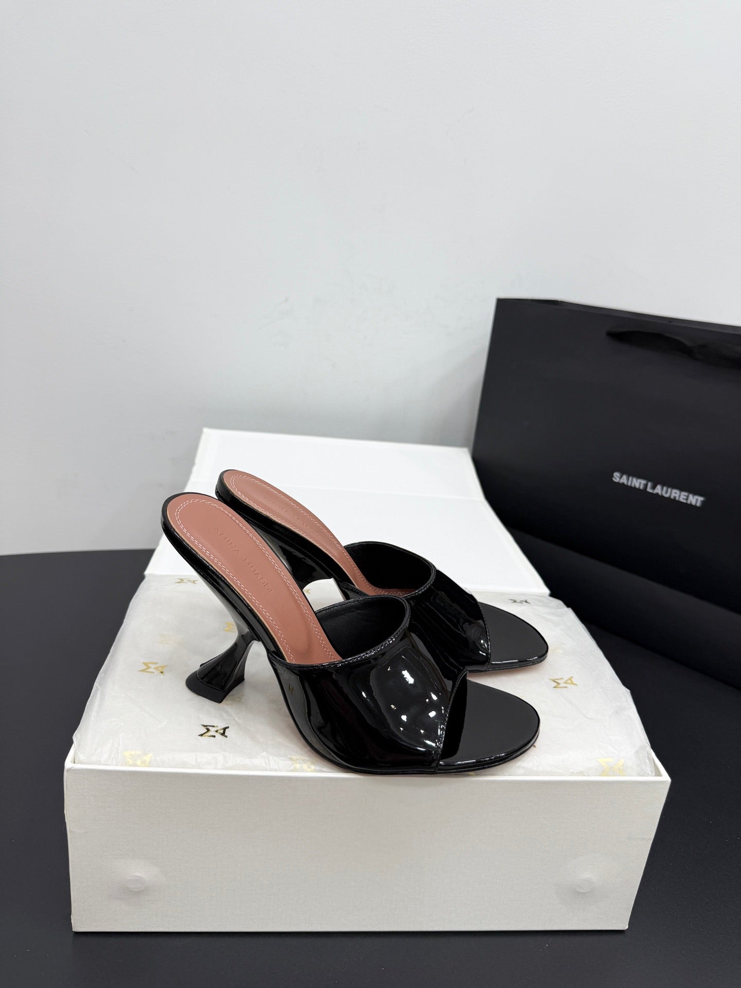 AMINA M HEELS