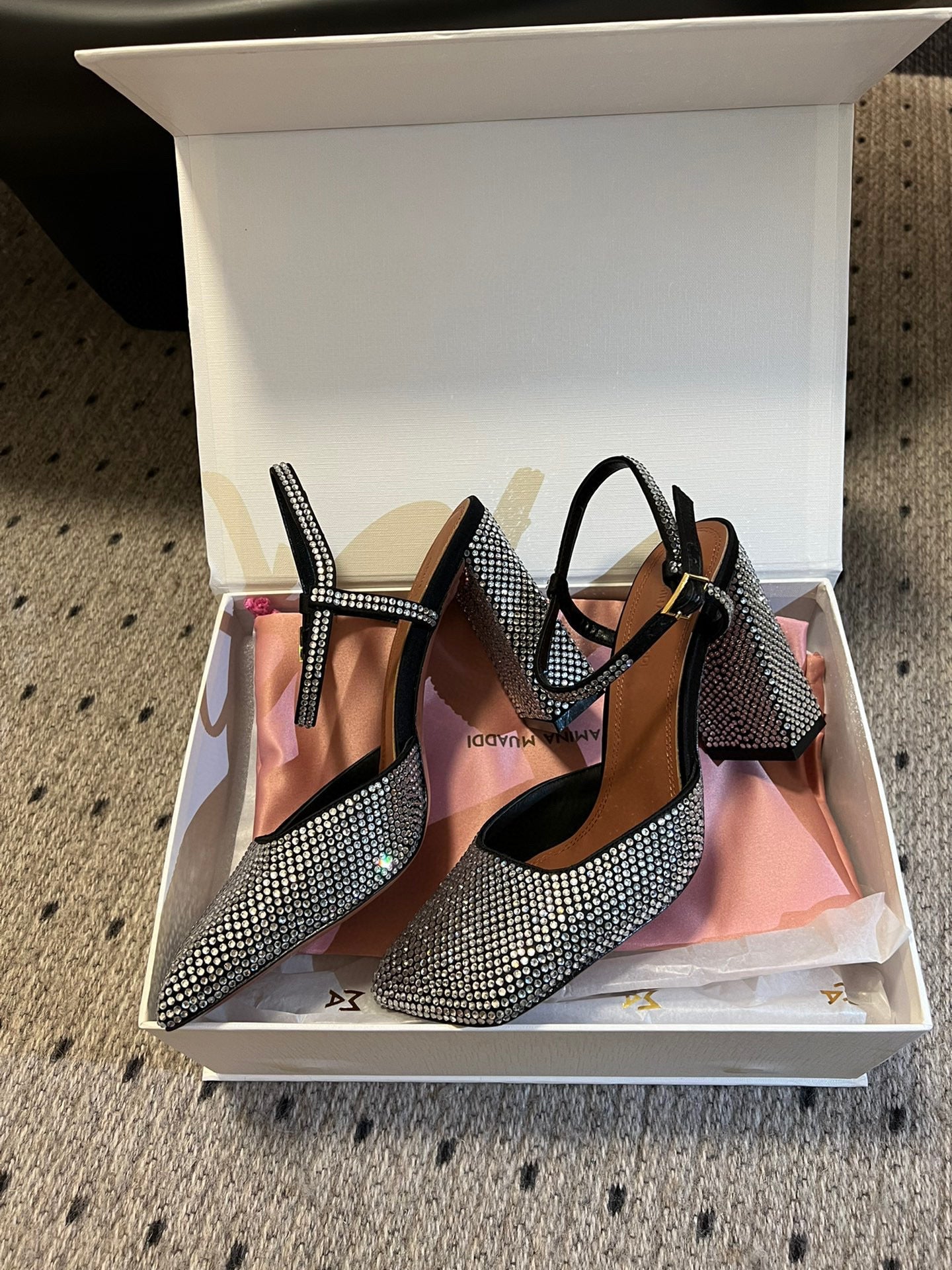 AMINA M HEELS