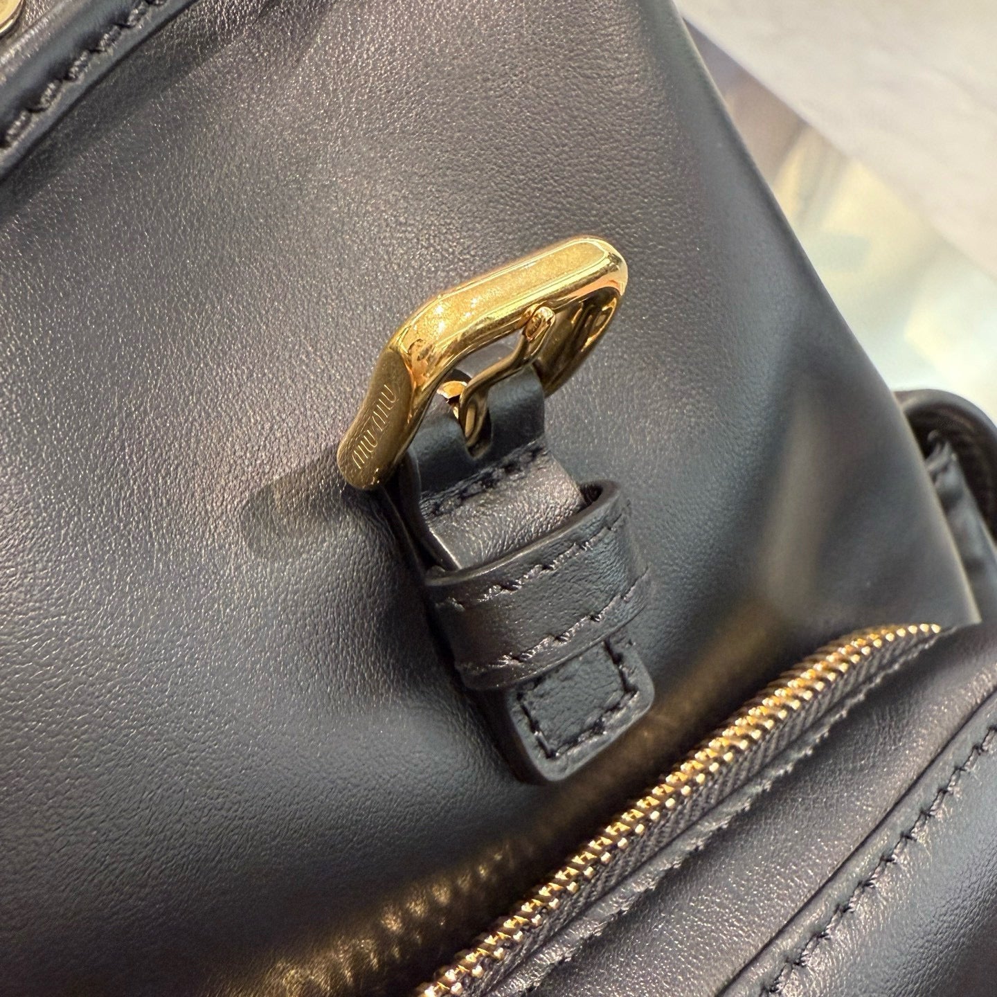 MIU M LEATHER BACKPACK