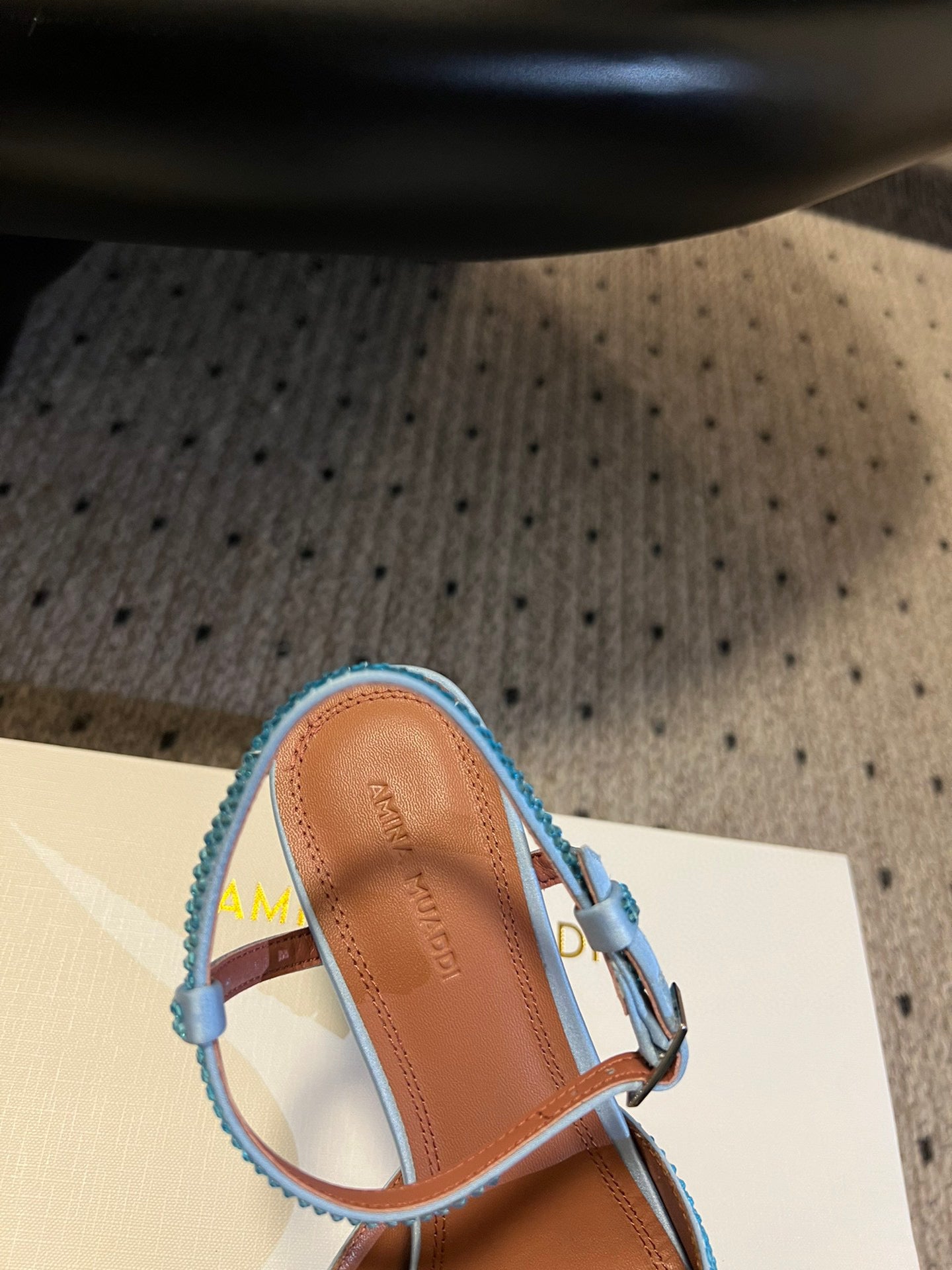 AMINA M HEELS