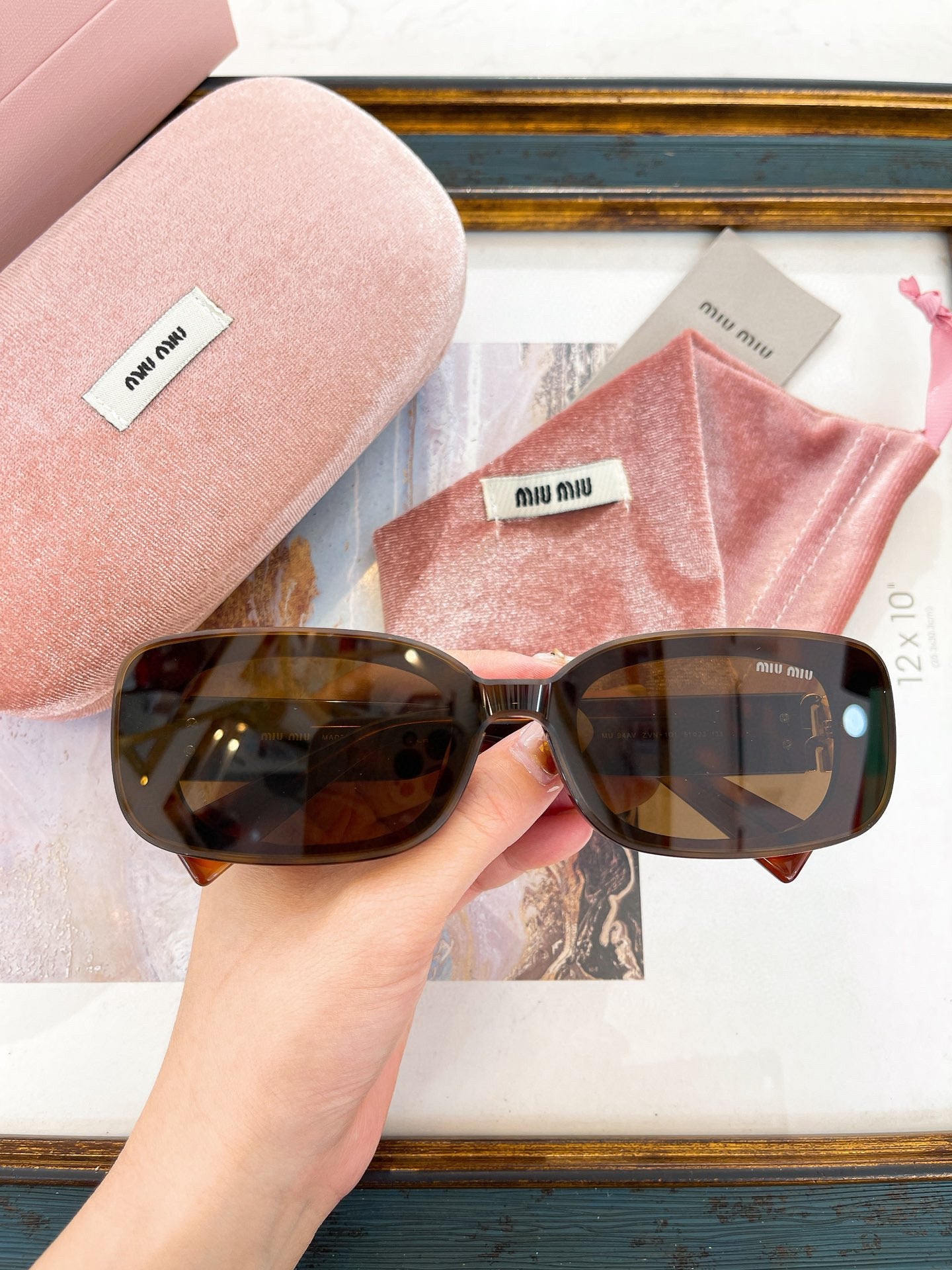 MIU M SUNGLASSES