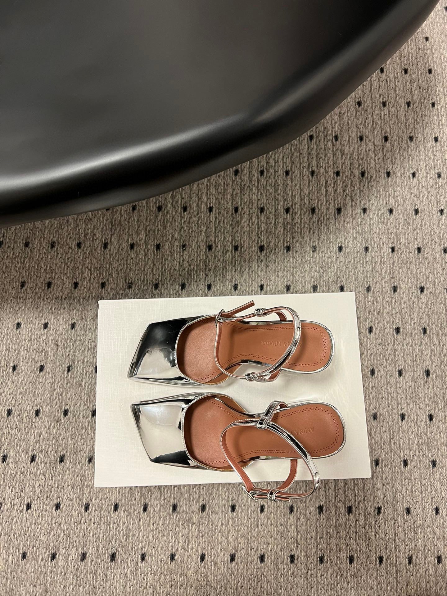 AMINA M HEELS