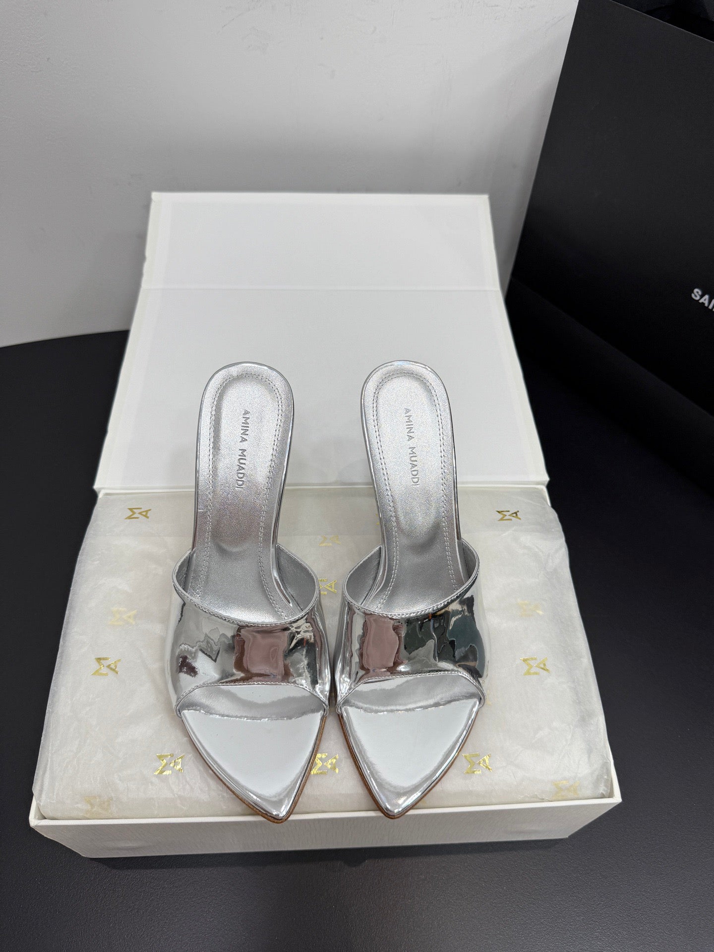 AMINA M HEELS