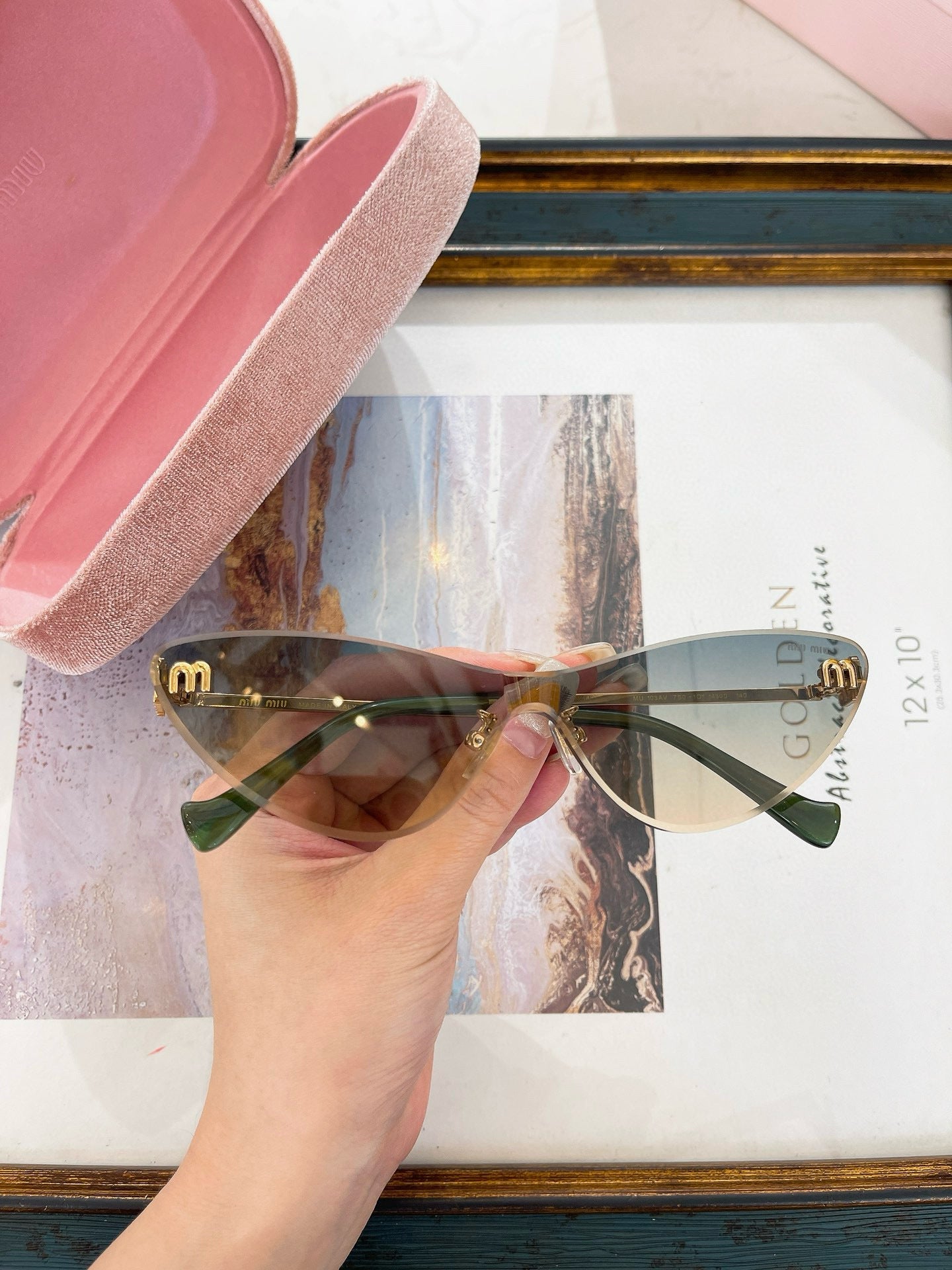 MIU M SUNGLASSES