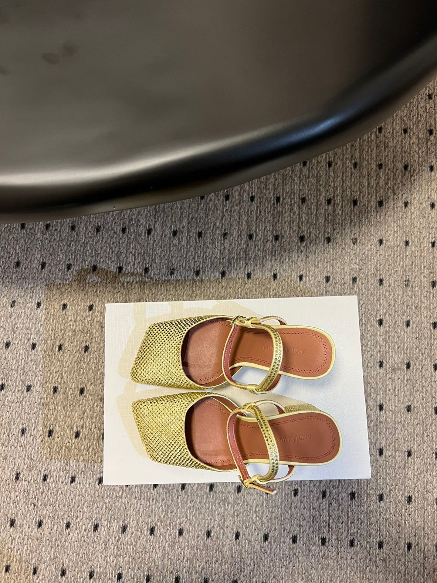 AMINA M HEELS