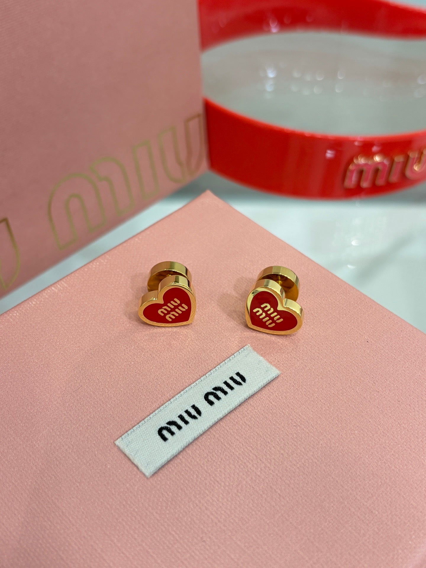 MIU M EARRINGS