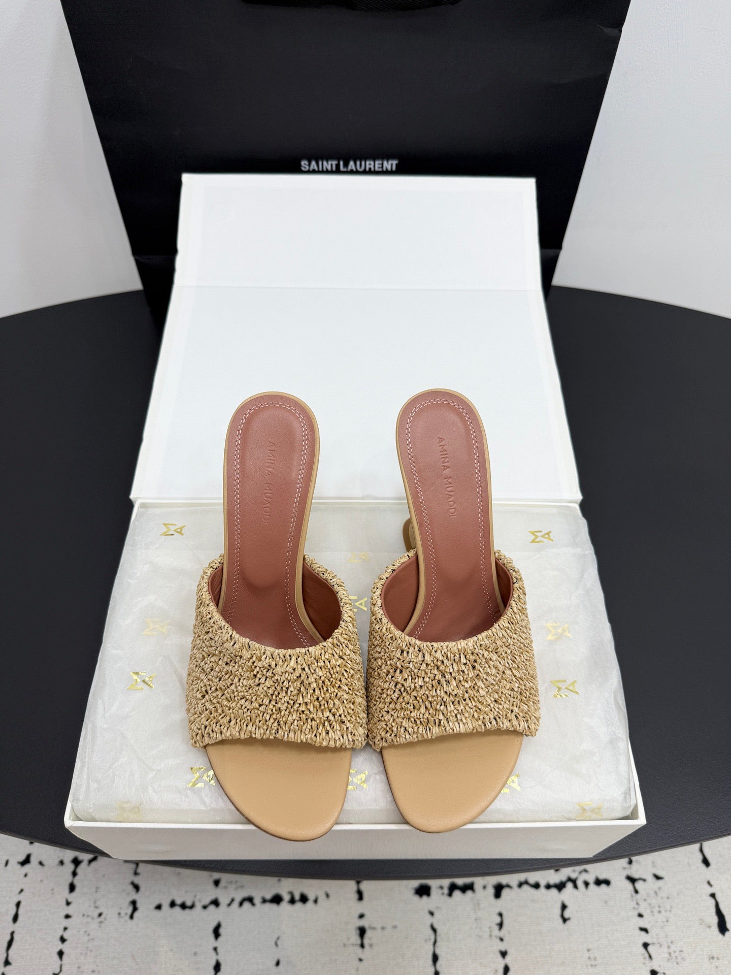 AMINA M HEELS
