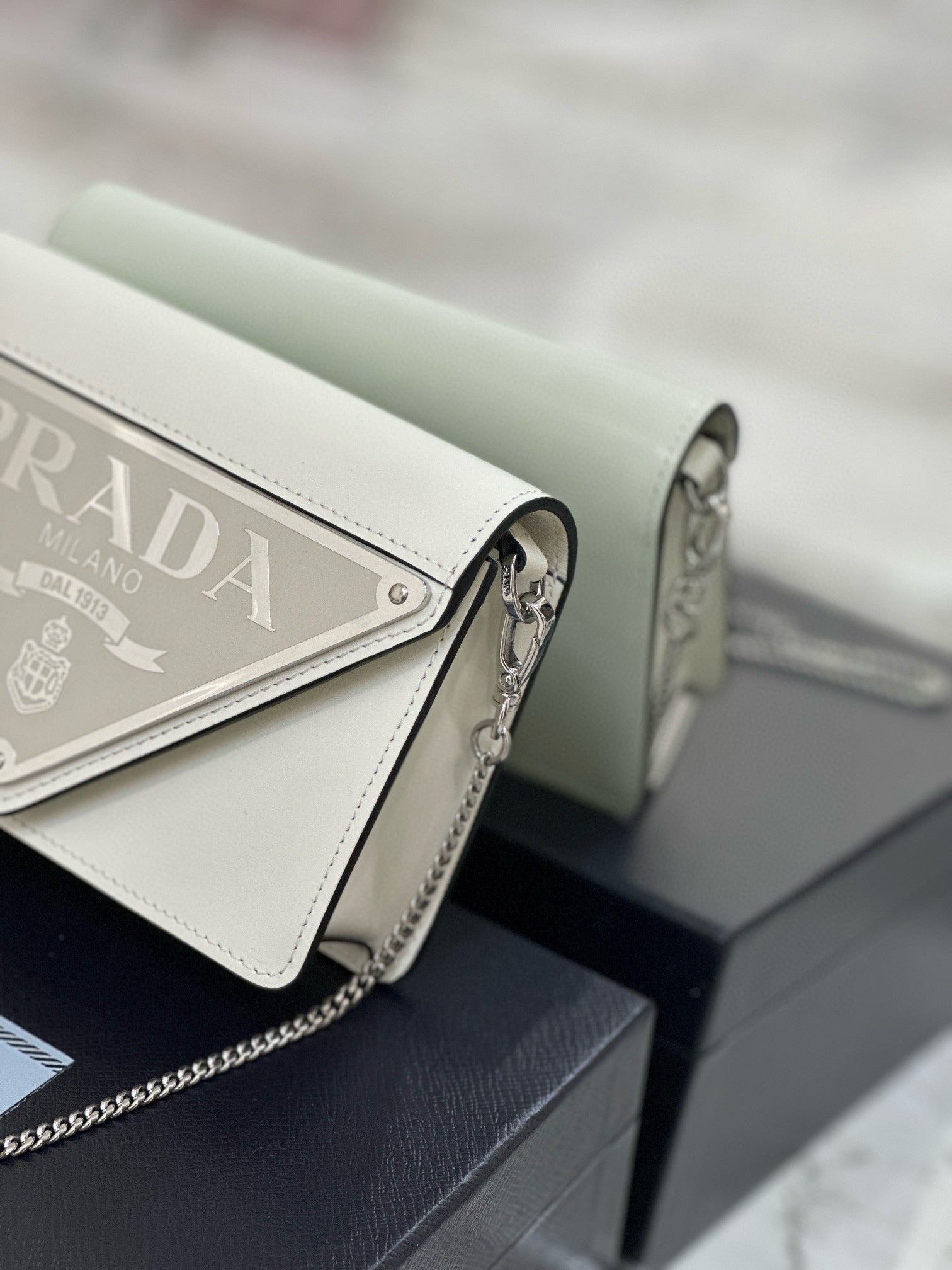 PD TRIANGLE LOGO BUFFED SHOULDER BAG
