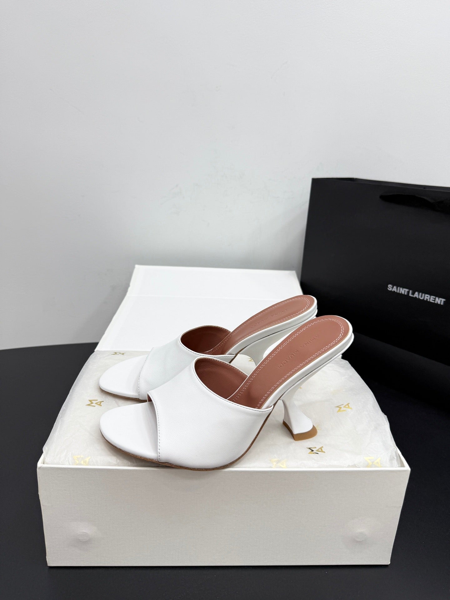 AMINA M HEELS